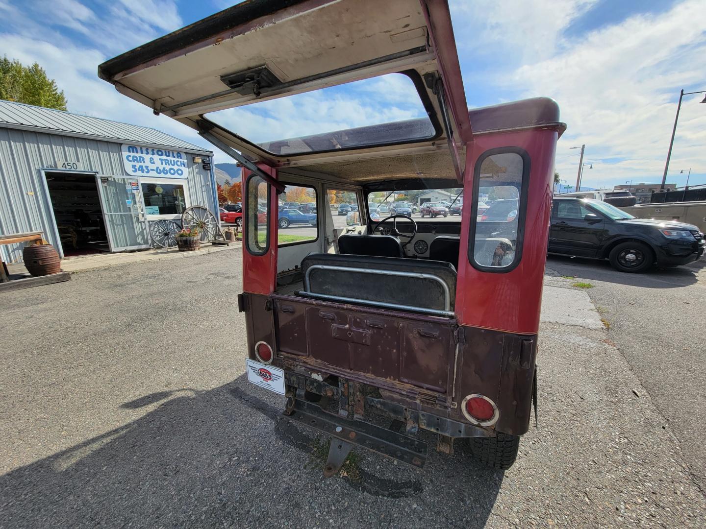 1965 Red American Motors Jeep (8305189188) with an 4 cylinder engine, 3 Speed Manual transmission, located at 450 N Russell, Missoula, MT, 59801, (406) 543-6600, 46.874496, -114.017433 - Photo#12