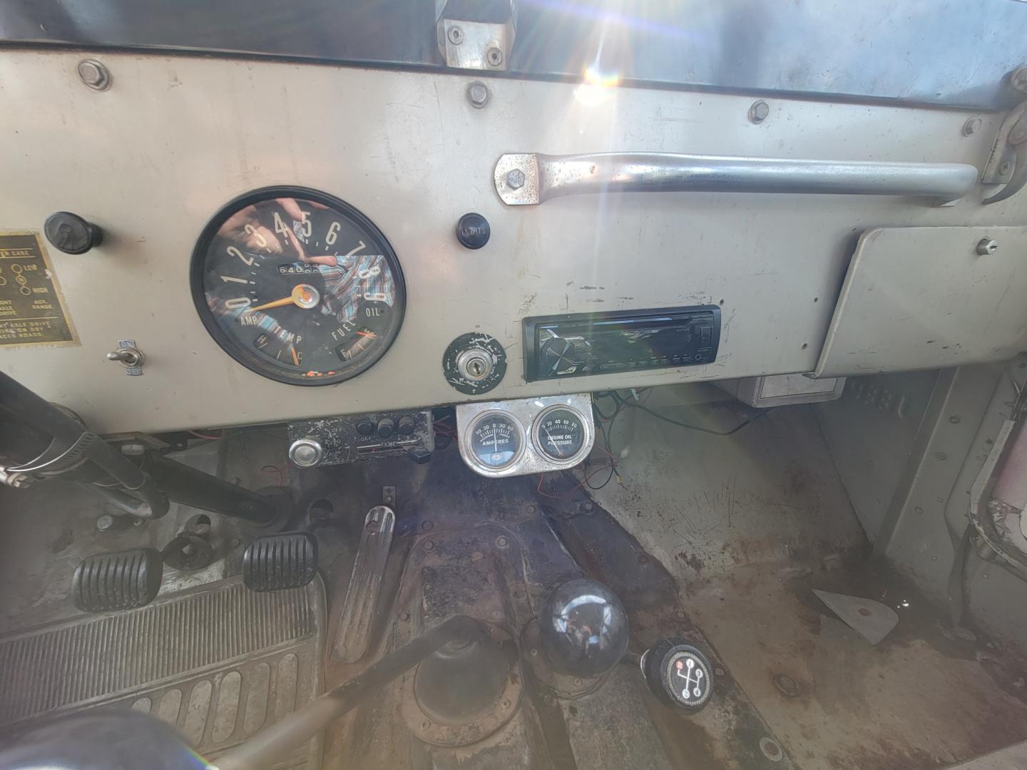 1965 Red American Motors Jeep (8305189188) with an 4 cylinder engine, 3 Speed Manual transmission, located at 450 N Russell, Missoula, MT, 59801, (406) 543-6600, 46.874496, -114.017433 - Photo#16