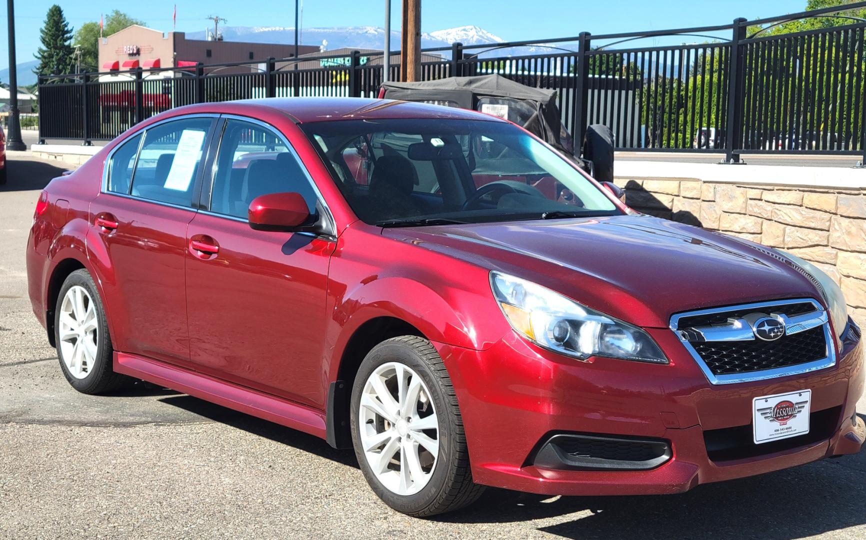 2013 Red /Tan Subaru Legacy 2.5 Premium (4S3BMBC6XD3) with an 2.5L H4 engine, Automatic transmission, located at 450 N Russell, Missoula, MT, 59801, (406) 543-6600, 46.874496, -114.017433 - Great running Suby. 2.5L H4 Engine. Automatic Transmission. Heated Seats. Power drivers Seat. Air. Cruise. Tilt. Power Windows and Locks. AM FM XM Cd Player. Small dent in Drivers door. - Photo#7