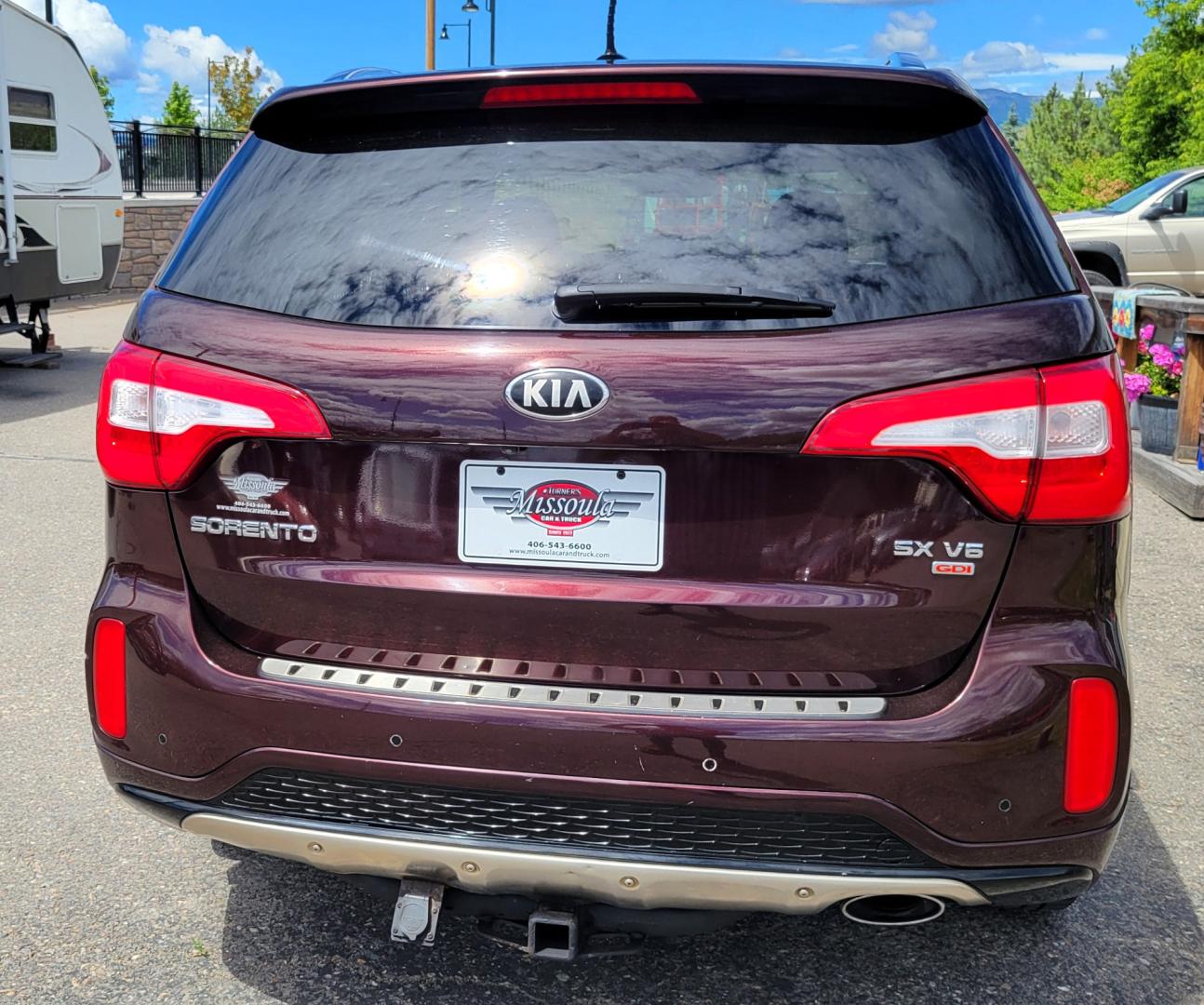 2014 Maroon /Black Kia Sorento SX (5XYKWDA7XEG) with an 3.3L V6 engine, 6 Speed Auto transmission, located at 450 N Russell, Missoula, MT, 59801, (406) 543-6600, 46.874496, -114.017433 - Beautiful AWD SUV. 3.3L V6 Engine. 6 Speed Automatic Transmission. Power Sunroof. Heated Leather Power Seats. Navigation. 3rd Row Seating. Bluetooth. Backup Camera. Front and Rear Climate Control. Power Rear Gate. Clean Carfax. - Photo#6