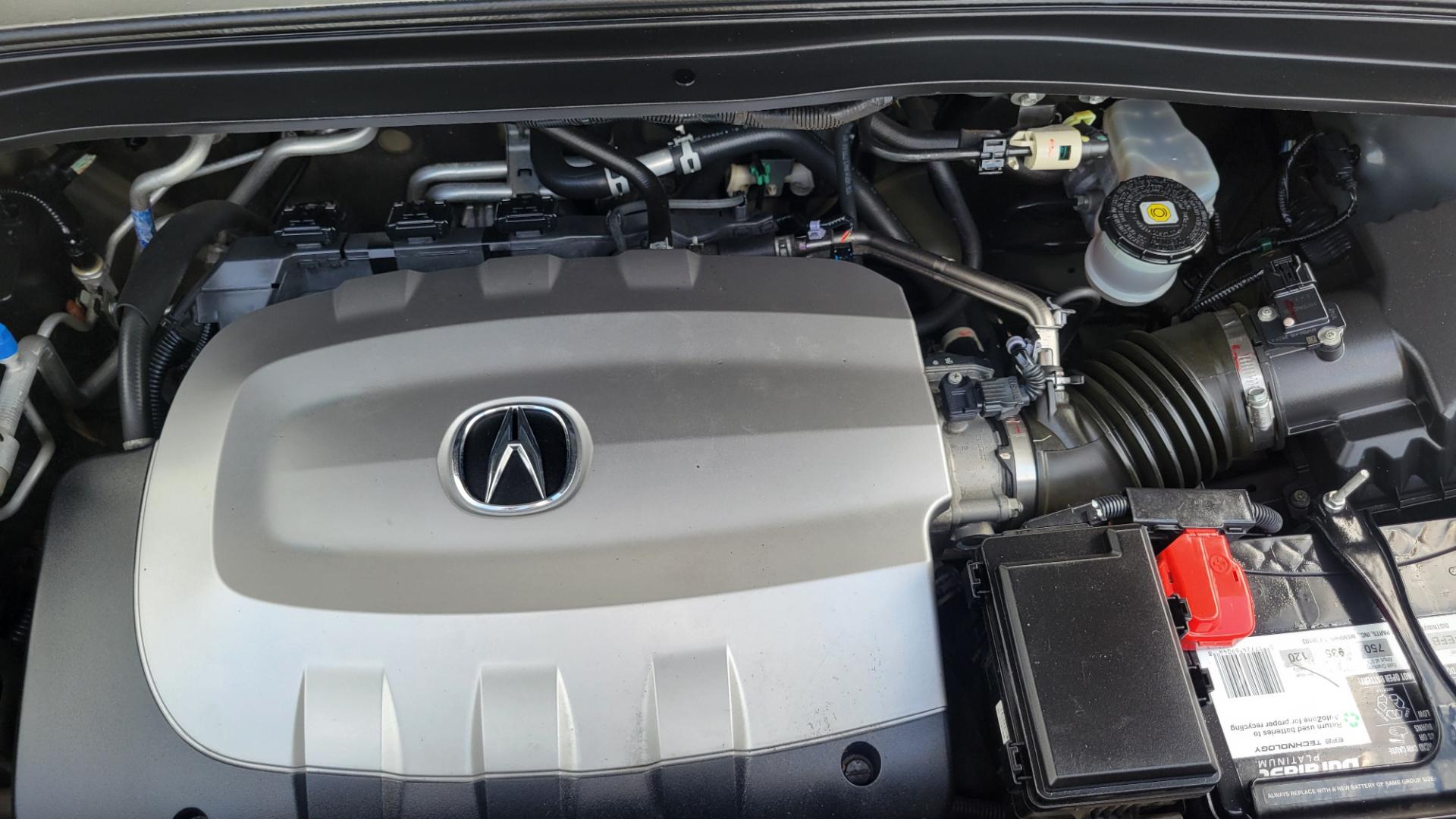 2012 Grey /Black Acura MDX Tech Package (2HNYD2H35CH) with an 3.7L V6 engine, 6 Speed Auto transmission, located at 450 N Russell, Missoula, MT, 59801, (406) 543-6600, 46.874496, -114.017433 - All Wheel Drive Acura MDX. 3.7 V6 Engine. 6 Speed Automatic Transmission. Heated Leather Seats. Power Sunroof. 3rd Row Seating. Bluetooth. Backup Camera. AM FM XM CD P,layer. Navigation. Front and Rear Air Conditioning. Power Windows and Locks. NEW TIRES! - Photo#25