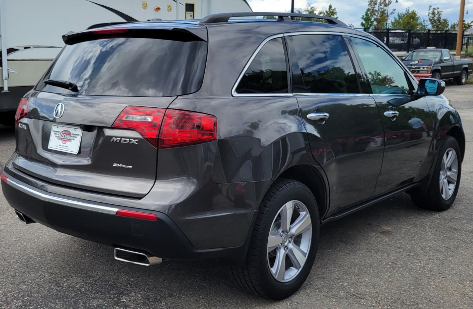 2012 Grey /Black Acura MDX Tech Package (2HNYD2H35CH) with an 3.7L V6 engine, 6 Speed Auto transmission, located at 450 N Russell, Missoula, MT, 59801, (406) 543-6600, 46.874496, -114.017433 - All Wheel Drive Acura MDX. 3.7 V6 Engine. 6 Speed Automatic Transmission. Heated Leather Seats. Power Sunroof. 3rd Row Seating. Bluetooth. Backup Camera. AM FM XM CD P,layer. Navigation. Front and Rear Air Conditioning. Power Windows and Locks. NEW TIRES! - Photo#7