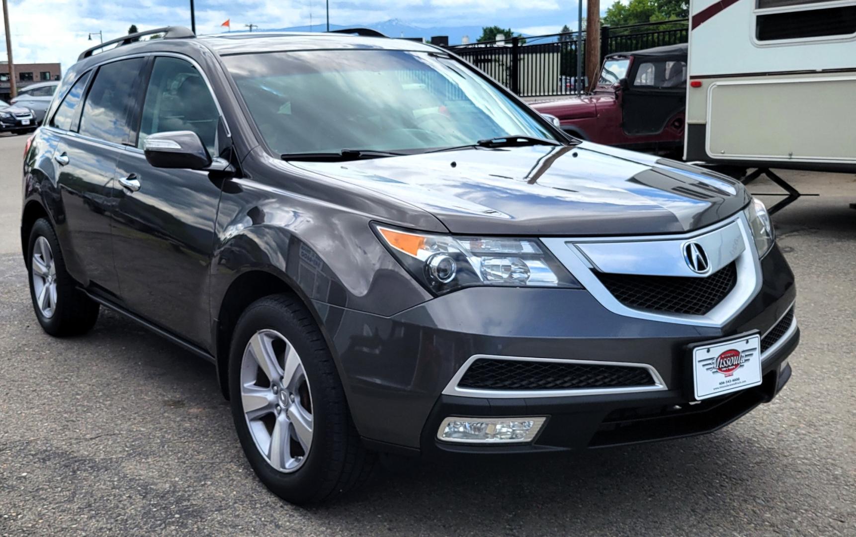 2012 Grey /Black Acura MDX Tech Package (2HNYD2H35CH) with an 3.7L V6 engine, 6 Speed Auto transmission, located at 450 N Russell, Missoula, MT, 59801, (406) 543-6600, 46.874496, -114.017433 - All Wheel Drive Acura MDX. 3.7 V6 Engine. 6 Speed Automatic Transmission. Heated Leather Seats. Power Sunroof. 3rd Row Seating. Bluetooth. Backup Camera. AM FM XM CD P,layer. Navigation. Front and Rear Air Conditioning. Power Windows and Locks. NEW TIRES! - Photo#4