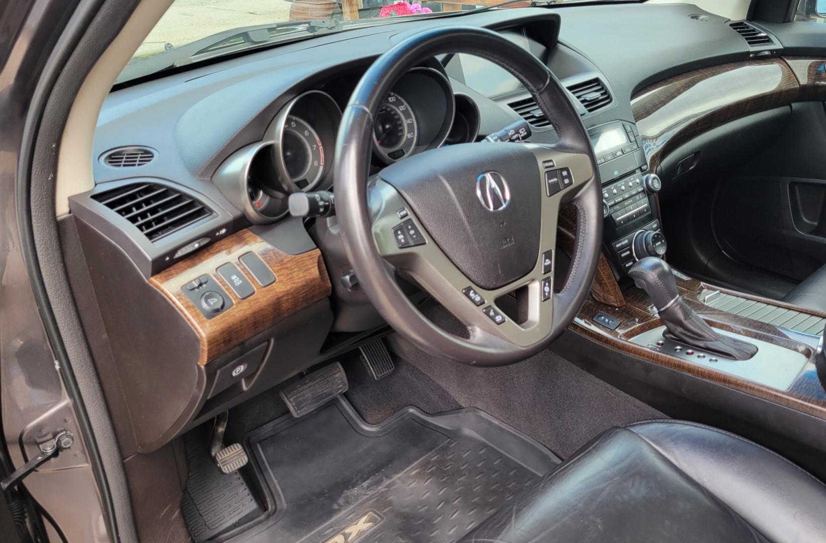 2012 Grey /Black Acura MDX Tech Package (2HNYD2H35CH) with an 3.7L V6 engine, 6 Speed Auto transmission, located at 450 N Russell, Missoula, MT, 59801, (406) 543-6600, 46.874496, -114.017433 - All Wheel Drive Acura MDX. 3.7 V6 Engine. 6 Speed Automatic Transmission. Heated Leather Seats. Power Sunroof. 3rd Row Seating. Bluetooth. Backup Camera. AM FM XM CD P,layer. Navigation. Front and Rear Air Conditioning. Power Windows and Locks. NEW TIRES! - Photo#17