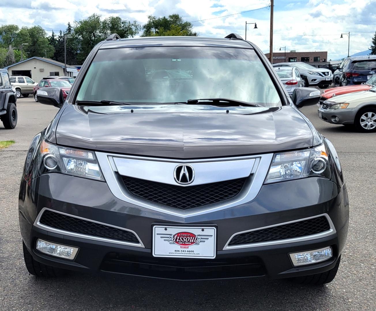 2012 Grey /Black Acura MDX Tech Package (2HNYD2H35CH) with an 3.7L V6 engine, 6 Speed Auto transmission, located at 450 N Russell, Missoula, MT, 59801, (406) 543-6600, 46.874496, -114.017433 - All Wheel Drive Acura MDX. 3.7 V6 Engine. 6 Speed Automatic Transmission. Heated Leather Seats. Power Sunroof. 3rd Row Seating. Bluetooth. Backup Camera. AM FM XM CD P,layer. Navigation. Front and Rear Air Conditioning. Power Windows and Locks. NEW TIRES! - Photo#3