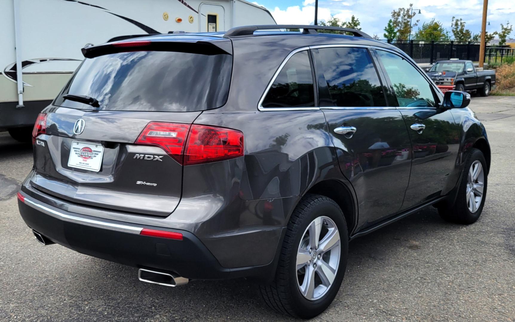 2012 Grey /Black Acura MDX Tech Package (2HNYD2H35CH) with an 3.7L V6 engine, 6 Speed Auto transmission, located at 450 N Russell, Missoula, MT, 59801, (406) 543-6600, 46.874496, -114.017433 - All Wheel Drive Acura MDX. 3.7 V6 Engine. 6 Speed Automatic Transmission. Heated Leather Seats. Power Sunroof. 3rd Row Seating. Bluetooth. Backup Camera. AM FM XM CD P,layer. Navigation. Front and Rear Air Conditioning. Power Windows and Locks. NEW TIRES! - Photo#6