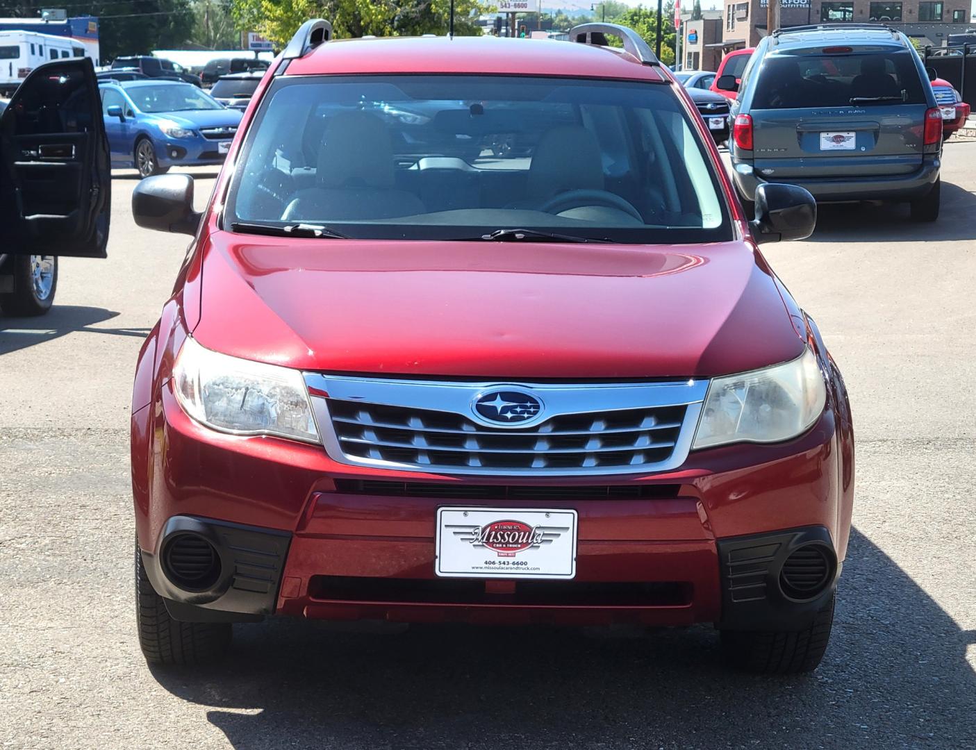 2012 Red /White Subaru Forester 2.5X (JF2SHABC3CH) with an 2.5L H4 engine, 4 Speed Auto transmission, located at 450 N Russell, Missoula, MT, 59801, (406) 543-6600, 46.874496, -114.017433 - Very Clean 2 Owner Forester. Good Carfax. 2.5L H4 Engine. Only 67K Miles. 4 Speed Automatic Transmission. AWD. Air Cruise. Tilt. Newer Uniroyal Tires. AM FM CD Player. - Photo#2