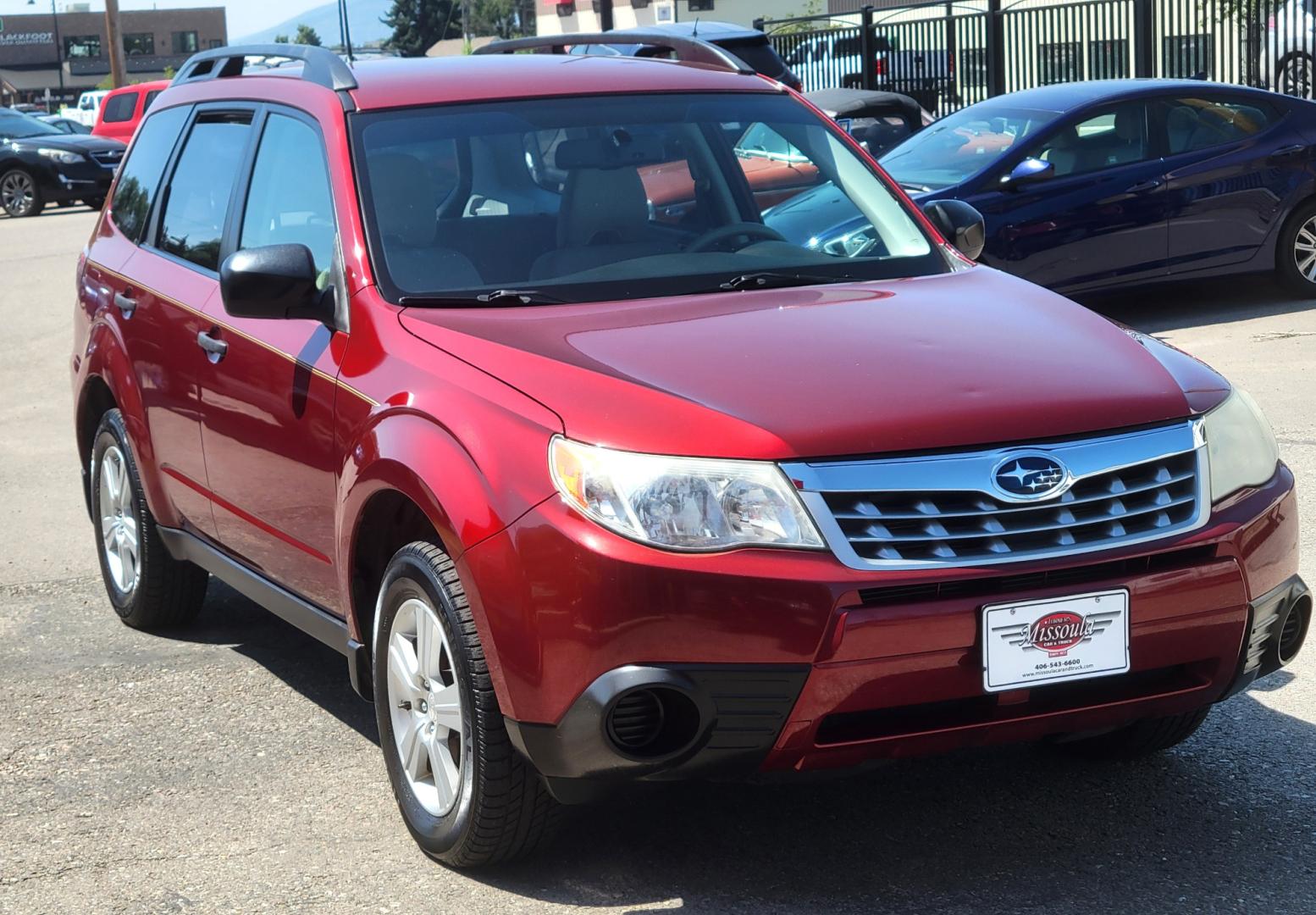 2012 Red /White Subaru Forester 2.5X (JF2SHABC3CH) with an 2.5L H4 engine, 4 Speed Auto transmission, located at 450 N Russell, Missoula, MT, 59801, (406) 543-6600, 46.874496, -114.017433 - Very Clean 2 Owner Forester. Good Carfax. 2.5L H4 Engine. Only 67K Miles. 4 Speed Automatic Transmission. AWD. Air Cruise. Tilt. Newer Uniroyal Tires. AM FM CD Player. - Photo#3