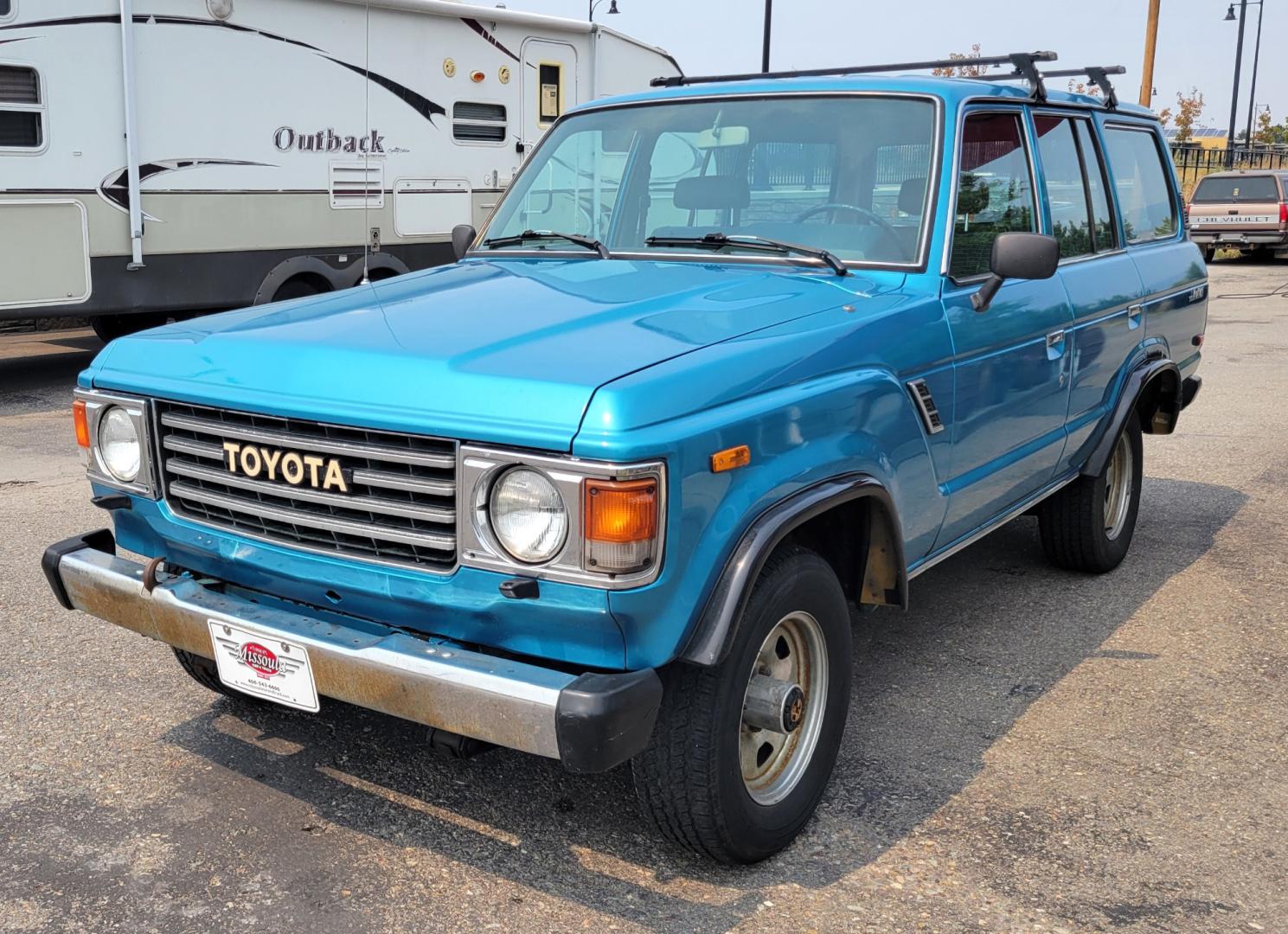 1984 Blue /Tan Toyota Land Cruiser FJ60 (JT3FJ60G3E1) with an 4.2L L6 engine, 4 Speed Manual transmission, located at 450 N Russell, Missoula, MT, 59801, (406) 543-6600, 46.874496, -114.017433 - Hard to find FJ. 4.2 Straight 6 Engine. 4 Speed Manual Transmission. Shows a little rust which i s common for this year of Land Cruiser. factory a/c pretty much an unmolested original still has smog pump original interior etc Current owner purchased in Bozeman in 1999 Because of the ag - Photo#2