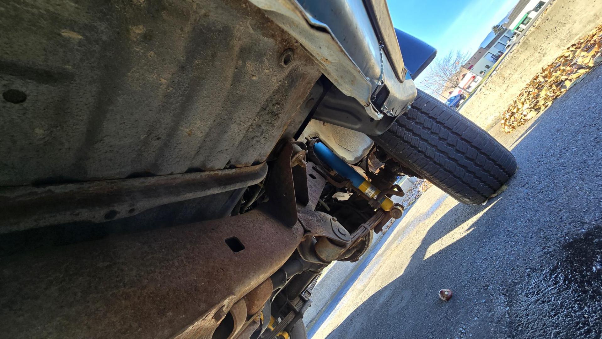 1984 Blue /Tan Toyota Land Cruiser FJ60 (JT3FJ60G3E1) with an 4.2L L6 engine, 4 Speed Manual transmission, located at 450 N Russell, Missoula, MT, 59801, (406) 543-6600, 46.874496, -114.017433 - Hard to find FJ. 4.2 Straight 6 Engine. 4 Speed Manual Transmission. Shows a little rust which i s common for this year of Land Cruiser. factory a/c pretty much an unmolested original still has smog pump original interior etc Current owner purchased in Bozeman in 1999 Because of the ag - Photo#18