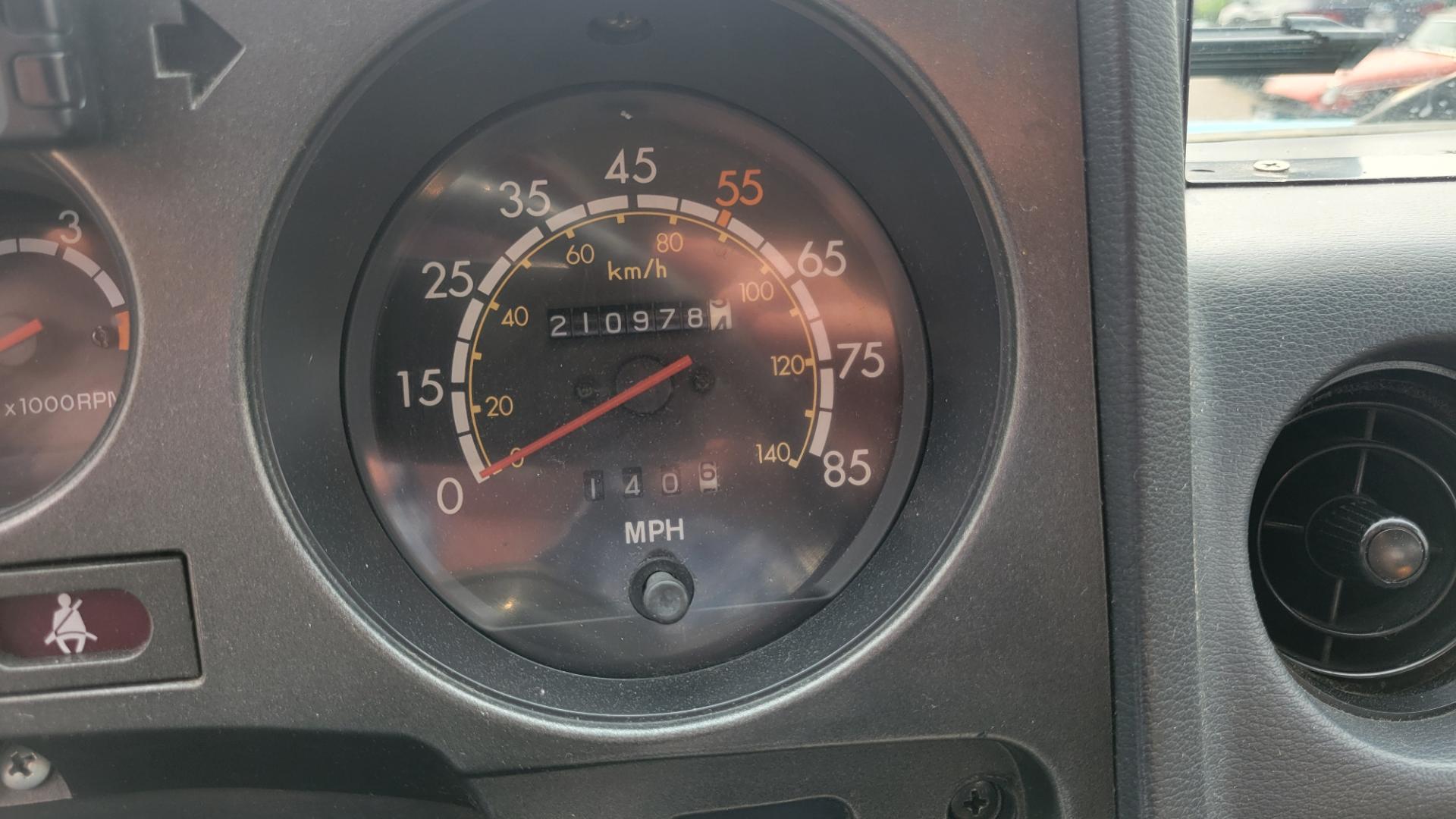 1984 Blue /Tan Toyota Land Cruiser FJ60 (JT3FJ60G3E1) with an 4.2L L6 engine, 4 Speed Manual transmission, located at 450 N Russell, Missoula, MT, 59801, (406) 543-6600, 46.874496, -114.017433 - Hard to find FJ. 4.2 Straight 6 Engine. 4 Speed Manual Transmission. Shows a little rust which i s common for this year of Land Cruiser. factory a/c pretty much an unmolested original still has smog pump original interior etc Current owner purchased in Bozeman in 1999 Because of the ag - Photo#14