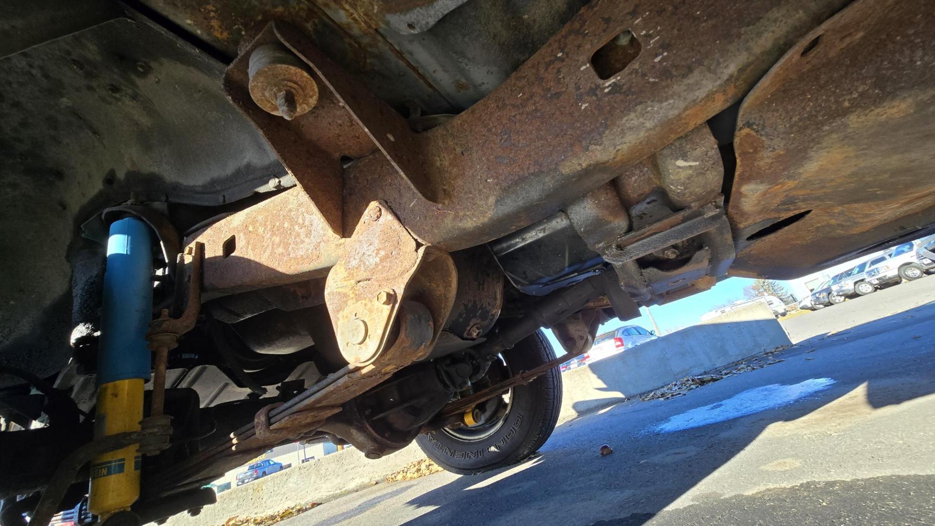 1984 Blue /Tan Toyota Land Cruiser FJ60 (JT3FJ60G3E1) with an 4.2L L6 engine, 4 Speed Manual transmission, located at 450 N Russell, Missoula, MT, 59801, (406) 543-6600, 46.874496, -114.017433 - Hard to find FJ. 4.2 Straight 6 Engine. 4 Speed Manual Transmission. Shows a little rust which i s common for this year of Land Cruiser. factory a/c pretty much an unmolested original still has smog pump original interior etc Current owner purchased in Bozeman in 1999 Because of the ag - Photo#21
