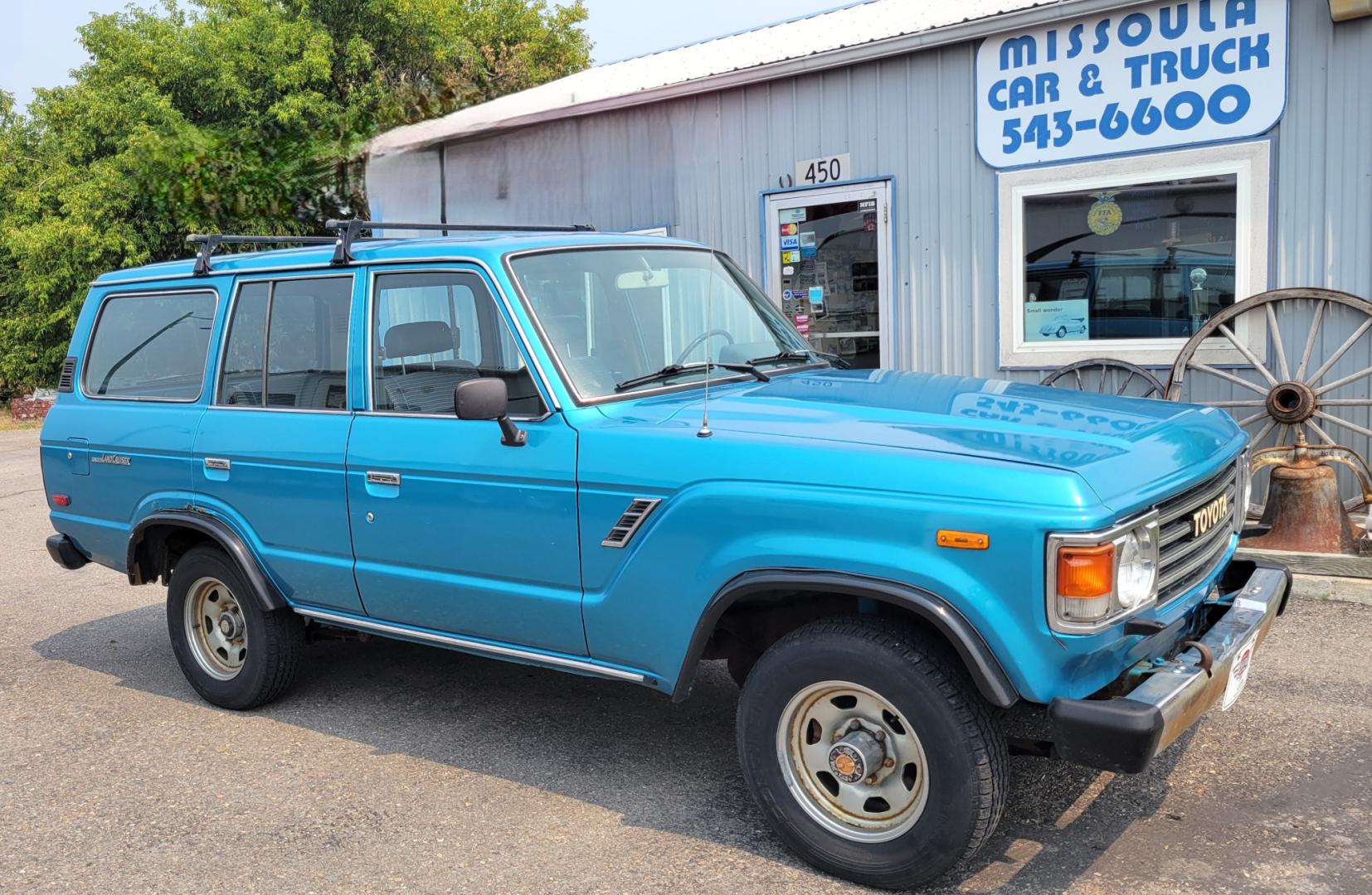 1984 Blue /Tan Toyota Land Cruiser FJ60 (JT3FJ60G3E1) with an 4.2L L6 engine, 4 Speed Manual transmission, located at 450 N Russell, Missoula, MT, 59801, (406) 543-6600, 46.874496, -114.017433 - Hard to find FJ. 4.2 Straight 6 Engine. 4 Speed Manual Transmission. Shows a little rust which i s common for this year of Land Cruiser. factory a/c pretty much an unmolested original still has smog pump original interior etc Current owner purchased in Bozeman in 1999 Because of the ag - Photo#0