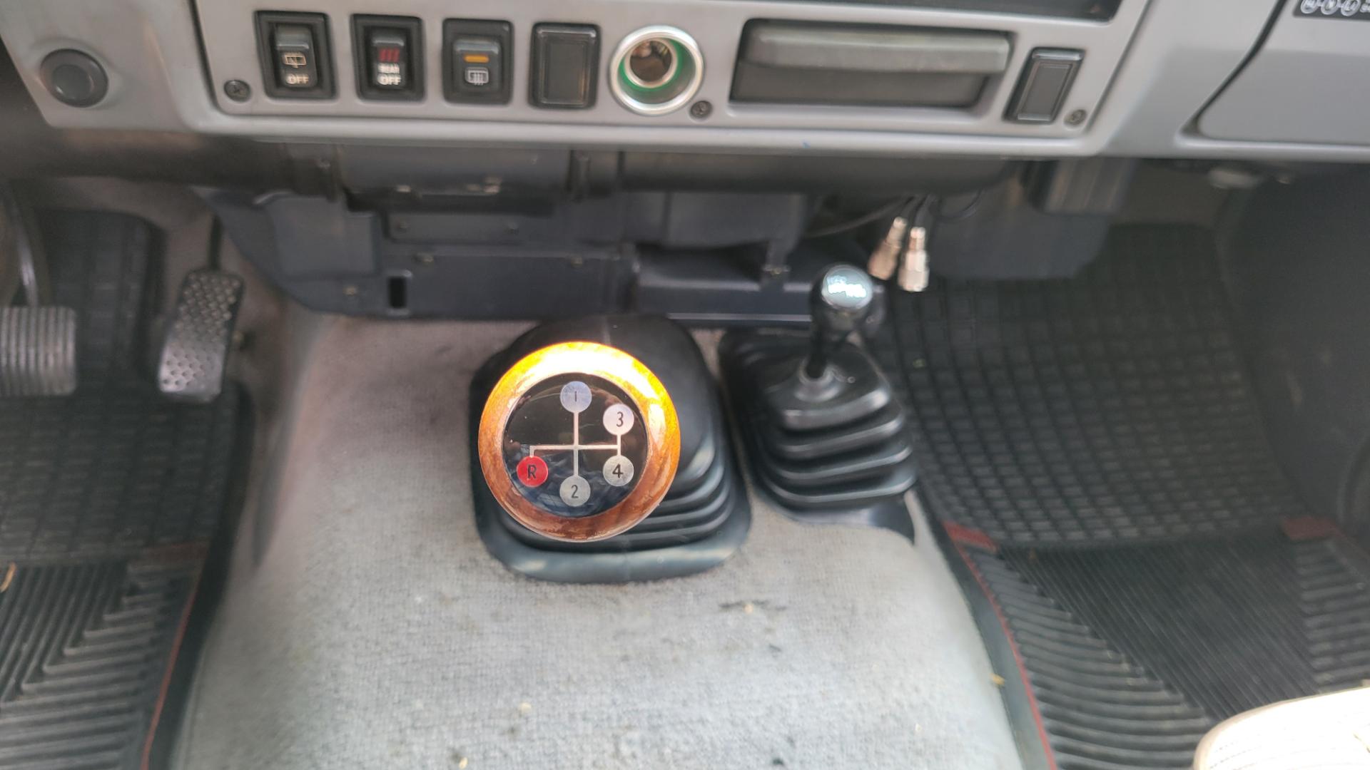 1984 Blue /Tan Toyota Land Cruiser FJ60 (JT3FJ60G3E1) with an 4.2L L6 engine, 4 Speed Manual transmission, located at 450 N Russell, Missoula, MT, 59801, (406) 543-6600, 46.874496, -114.017433 - Hard to find FJ. 4.2 Straight 6 Engine. 4 Speed Manual Transmission. Shows a little rust which i s common for this year of Land Cruiser. factory a/c pretty much an unmolested original still has smog pump original interior etc Current owner purchased in Bozeman in 1999 Because of the ag - Photo#16