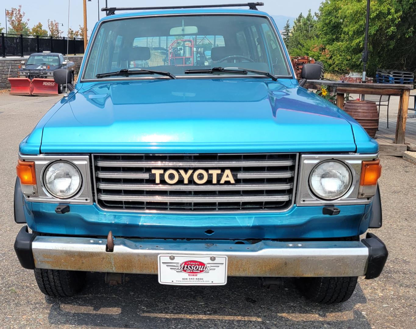 1984 Blue /Tan Toyota Land Cruiser FJ60 (JT3FJ60G3E1) with an 4.2L L6 engine, 4 Speed Manual transmission, located at 450 N Russell, Missoula, MT, 59801, (406) 543-6600, 46.874496, -114.017433 - Hard to find FJ. 4.2 Straight 6 Engine. 4 Speed Manual Transmission. Shows a little rust which i s common for this year of Land Cruiser. factory a/c pretty much an unmolested original still has smog pump original interior etc Current owner purchased in Bozeman in 1999 Because of the ag - Photo#1