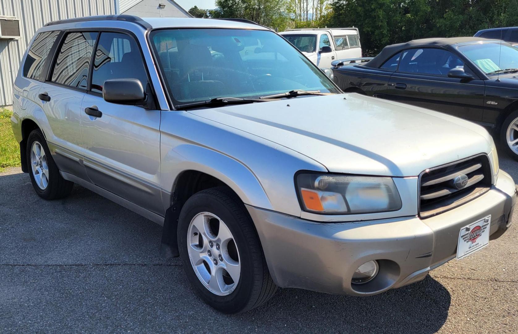2003 Silver /Gray Subaru Forester 2.5 XS (JF1SG65633H) with an 2.5L H4 SOHC 16V engine, 4-Speed Automatic Overdrive transmission, located at 450 N Russell, Missoula, MT, 59801, (406) 543-6600, 46.874496, -114.017433 - 2.5L I4 Engine. AWD. Automatic Transmission. Air Blows Cold. The engine seems a little tired so we are selling as an around town vehicle or for parts as most of the body is very good and the transmission seems strong. Starts every time. Financing is not available. - Photo#0
