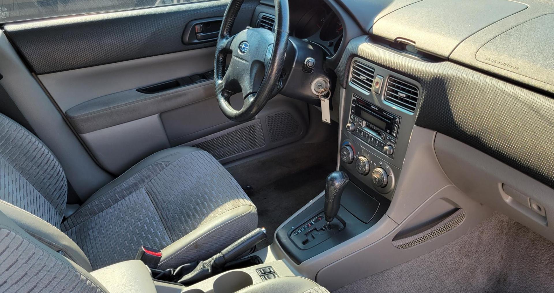 2003 Silver /Gray Subaru Forester 2.5 XS (JF1SG65633H) with an 2.5L H4 SOHC 16V engine, 4-Speed Automatic Overdrive transmission, located at 450 N Russell, Missoula, MT, 59801, (406) 543-6600, 46.874496, -114.017433 - 2.5L I4 Engine. AWD. Automatic Transmission. Air Blows Cold. The engine seems a little tired so we are selling as an around town vehicle or for parts as most of the body is very good and the transmission seems strong. Starts every time. Financing is not available. - Photo#12