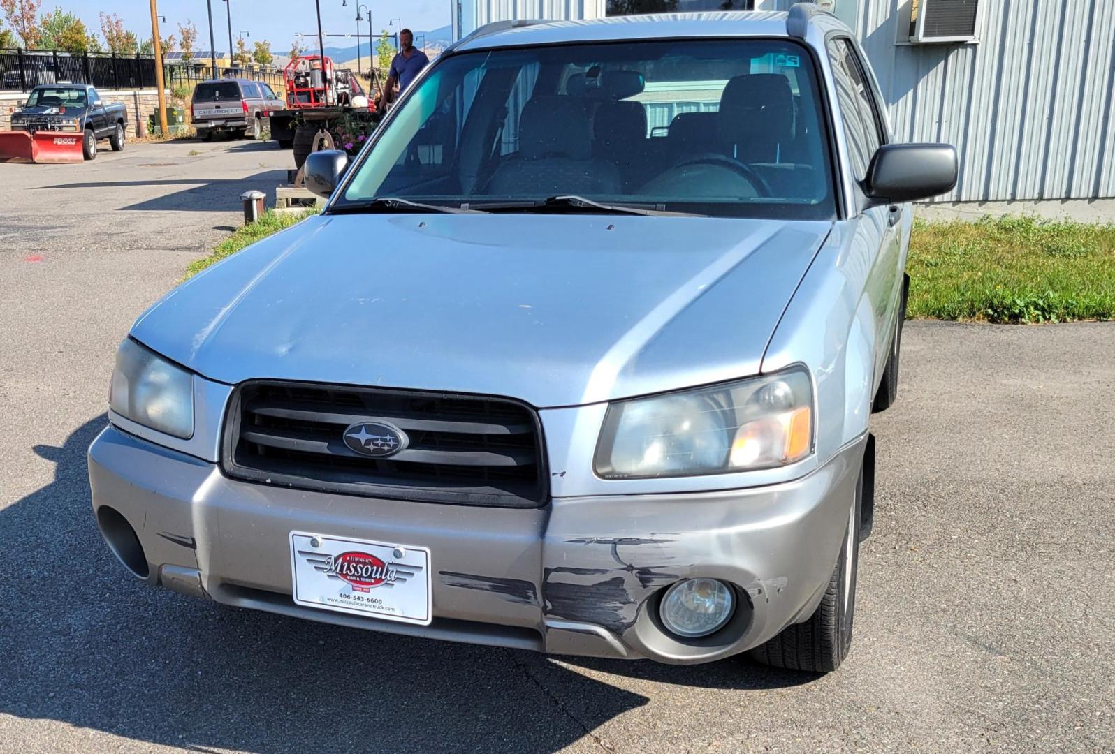 2003 Silver /Gray Subaru Forester 2.5 XS (JF1SG65633H) with an 2.5L H4 SOHC 16V engine, 4-Speed Automatic Overdrive transmission, located at 450 N Russell, Missoula, MT, 59801, (406) 543-6600, 46.874496, -114.017433 - 2.5L I4 Engine. AWD. Automatic Transmission. Air Blows Cold. The engine seems a little tired so we are selling as an around town vehicle or for parts as most of the body is very good and the transmission seems strong. Starts every time. Financing is not available. - Photo#2