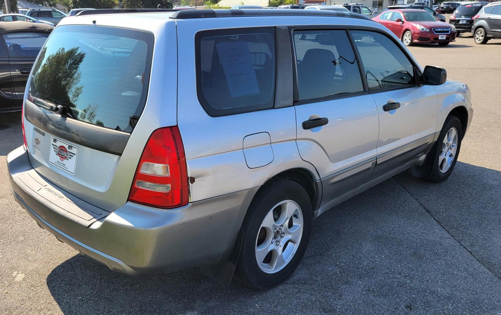 2003 Silver /Gray Subaru Forester 2.5 XS (JF1SG65633H) with an 2.5L H4 SOHC 16V engine, 4-Speed Automatic Overdrive transmission, located at 450 N Russell, Missoula, MT, 59801, (406) 543-6600, 46.874496, -114.017433 - 2.5L I4 Engine. AWD. Automatic Transmission. Air Blows Cold. The engine seems a little tired so we are selling as an around town vehicle or for parts as most of the body is very good and the transmission seems strong. Starts every time. Financing is not available. - Photo#6