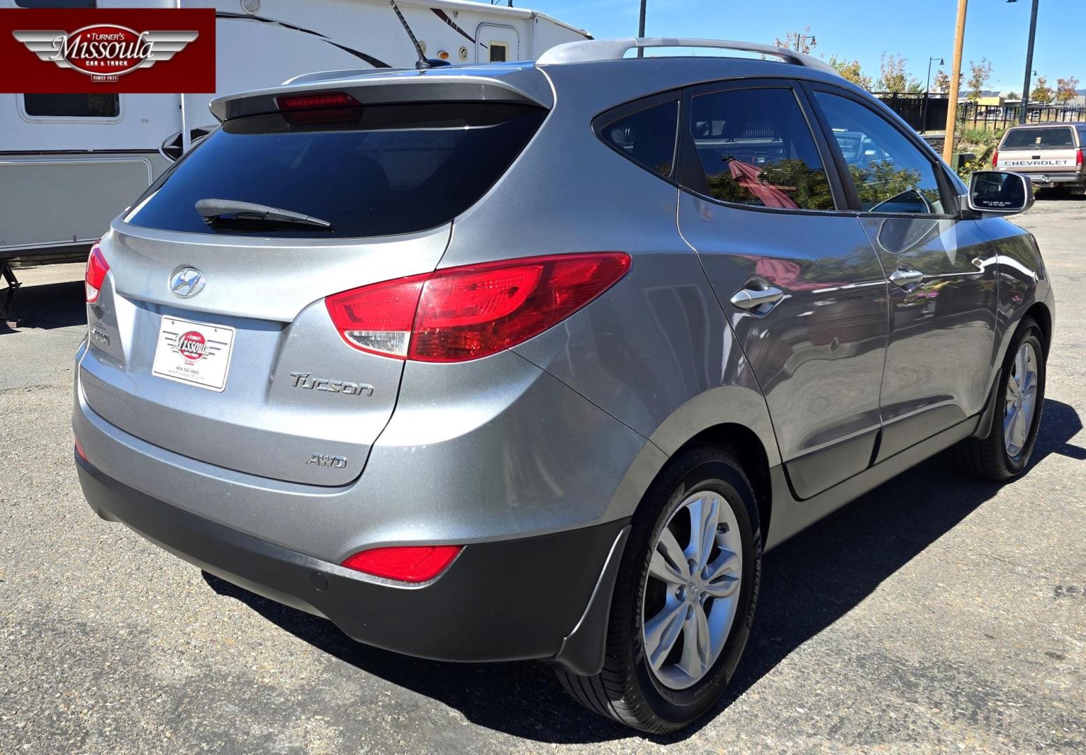 2010 Silver /Black Hyundai Tucson GLS AWD (KM8JUCAC5AU) with an 2.4L L4 DOHC 16V engine, 6-Speed Auto transmission, located at 450 N Russell, Missoula, MT, 59801, (406) 543-6600, 46.874496, -114.017433 - Photo#5