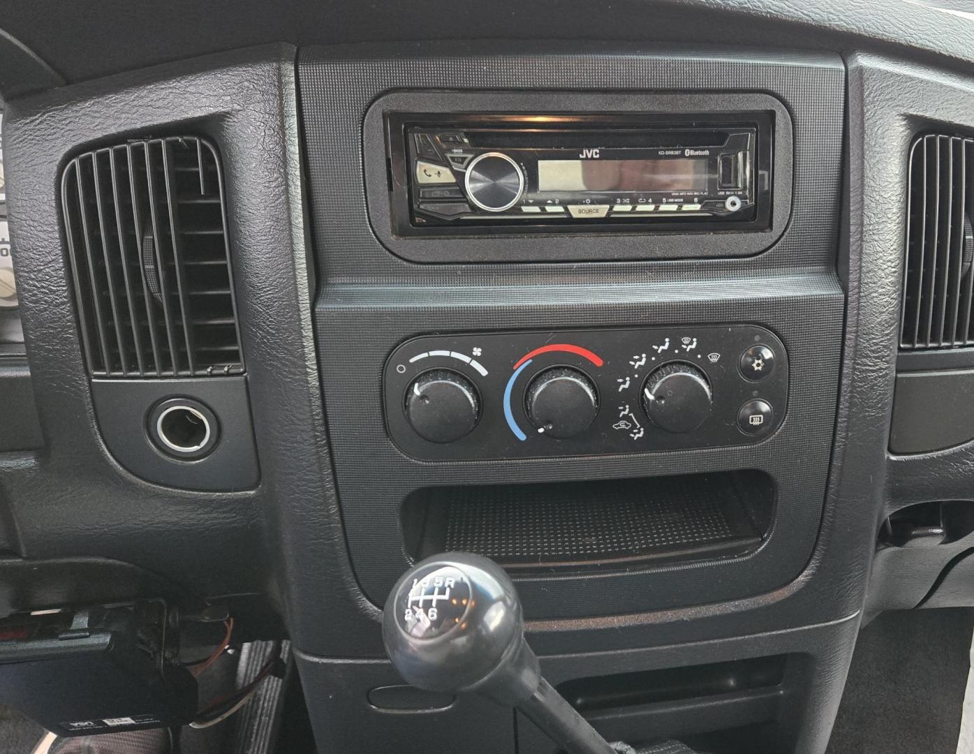 2003 Blue /Black Dodge Ram 2500 Laramie Quad Cab Long Bed 4WD (3D7KU28C13G) with an 5.9L L6 OHV 24V TURBO DIESEL engine, 6 Speed Manual transmission, located at 450 N Russell, Missoula, MT, 59801, (406) 543-6600, 46.874496, -114.017433 - Very Nice 5.9 Diesel 4WD Pickup. Hard to find 6 Speed Manual Transmission. Great Miles for it's age. Air Cruise. Tilt. Power Windows and Locks. Power Drivers Seat. Running Boards. Nice Tires and Wheels. Towing. Because of the age of this vehicle, financing is NOT available. - Photo#10