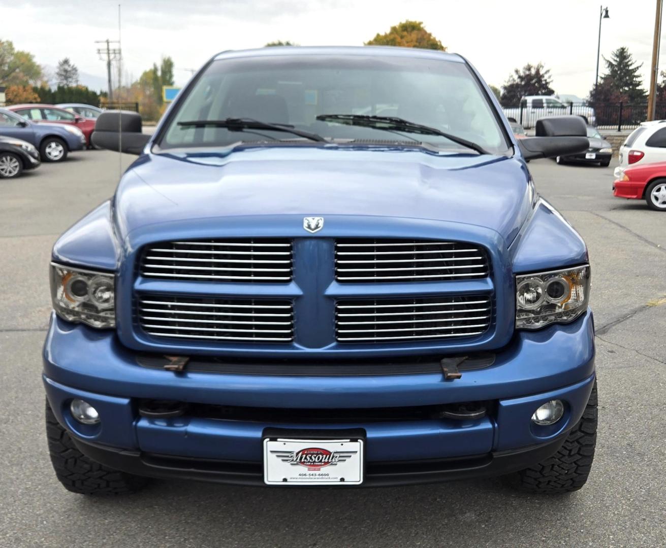 2003 Blue /Black Dodge Ram 2500 Laramie Quad Cab Long Bed 4WD (3D7KU28C13G) with an 5.9L L6 OHV 24V TURBO DIESEL engine, 6 Speed Manual transmission, located at 450 N Russell, Missoula, MT, 59801, (406) 543-6600, 46.874496, -114.017433 - Very Nice 5.9 Diesel 4WD Pickup. Hard to find 6 Speed Manual Transmission. Great Miles for it's age. Air Cruise. Tilt. Power Windows and Locks. Power Drivers Seat. Running Boards. Nice Tires and Wheels. Towing. Because of the age of this vehicle, financing is NOT available. - Photo#3