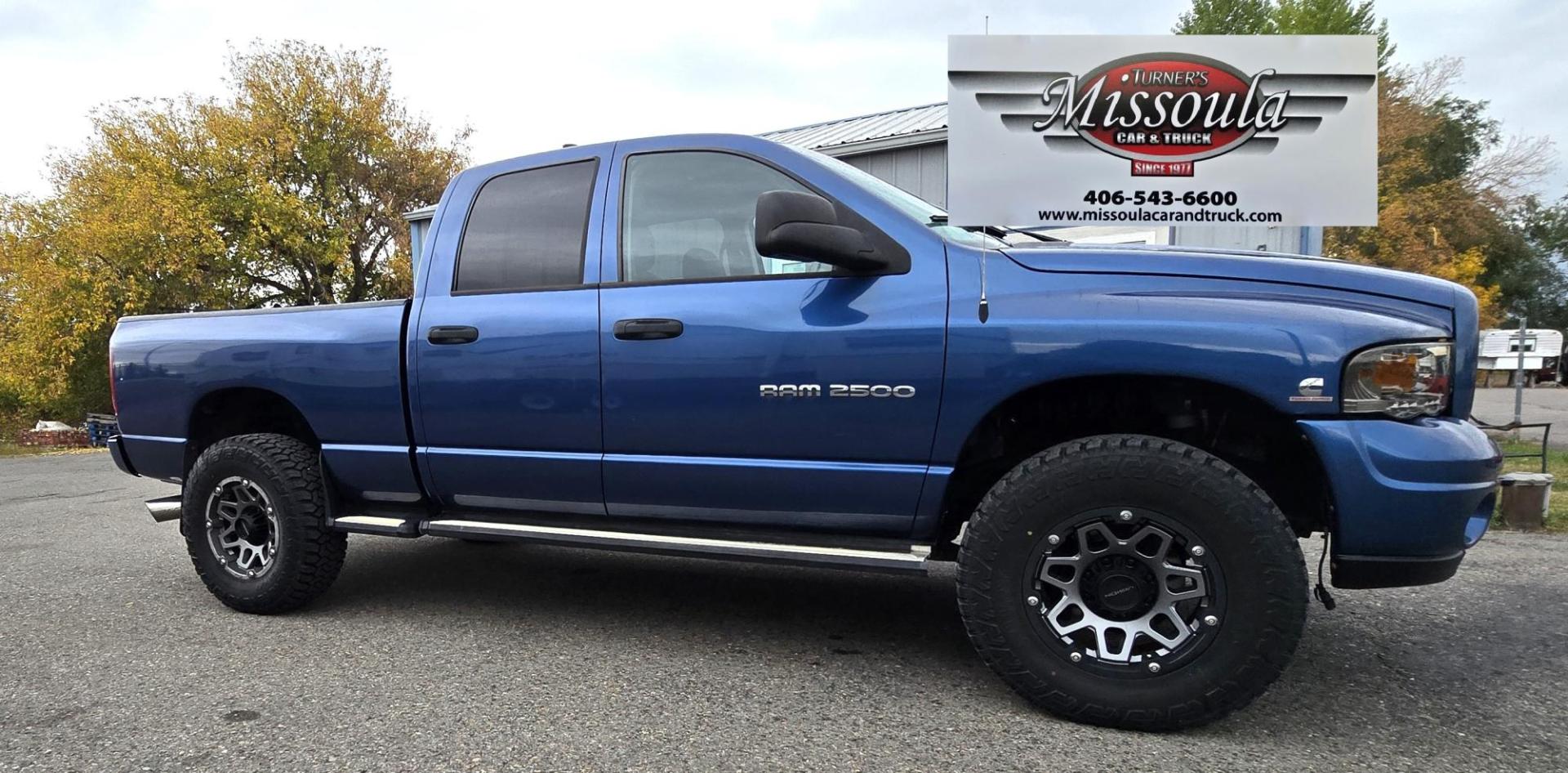 2003 Blue /Black Dodge Ram 2500 Laramie Quad Cab Long Bed 4WD (3D7KU28C13G) with an 5.9L L6 OHV 24V TURBO DIESEL engine, 6 Speed Manual transmission, located at 450 N Russell, Missoula, MT, 59801, (406) 543-6600, 46.874496, -114.017433 - Very Nice 5.9 Diesel 4WD Pickup. Hard to find 6 Speed Manual Transmission. Great Miles for it's age. Air Cruise. Tilt. Power Windows and Locks. Power Drivers Seat. Running Boards. Nice Tires and Wheels. Towing. Because of the age of this vehicle, financing is NOT available. - Photo#8