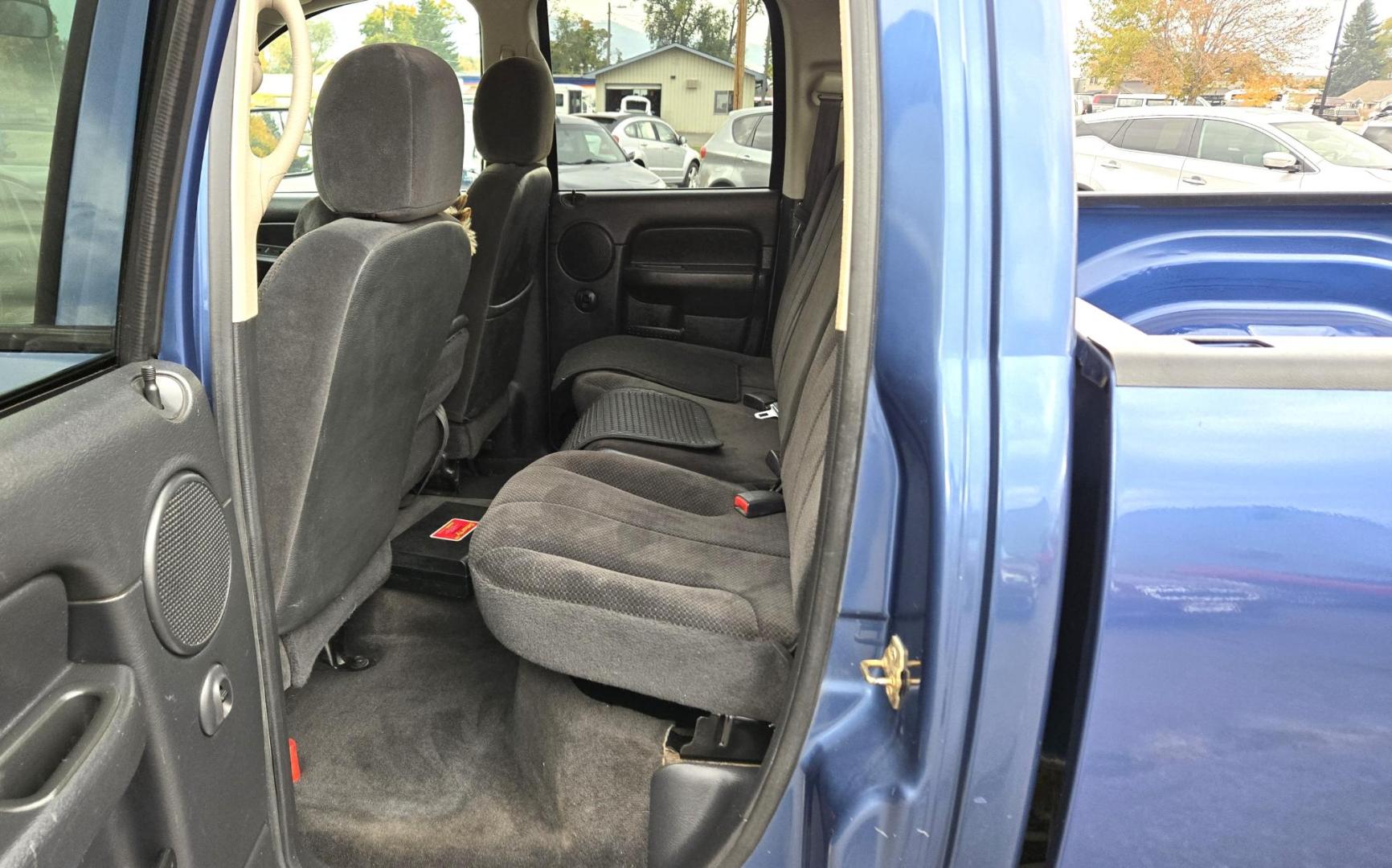 2003 Blue /Black Dodge Ram 2500 Laramie Quad Cab Long Bed 4WD (3D7KU28C13G) with an 5.9L L6 OHV 24V TURBO DIESEL engine, 6 Speed Manual transmission, located at 450 N Russell, Missoula, MT, 59801, (406) 543-6600, 46.874496, -114.017433 - Very Nice 5.9 Diesel 4WD Pickup. Hard to find 6 Speed Manual Transmission. Great Miles for it's age. Air Cruise. Tilt. Power Windows and Locks. Power Drivers Seat. Running Boards. Nice Tires and Wheels. Towing. Because of the age of this vehicle, financing is NOT available. - Photo#13
