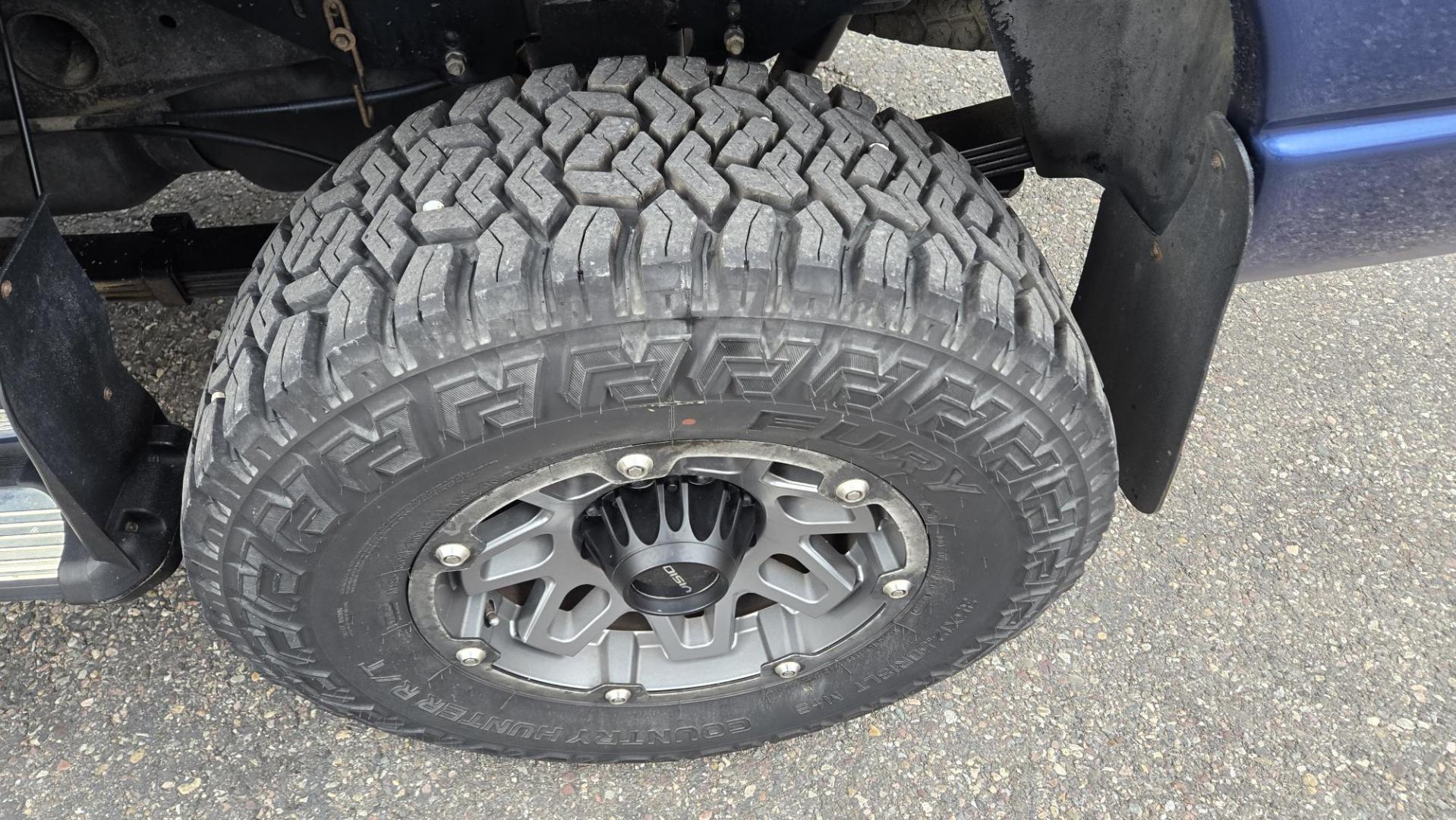 2003 Blue /Black Dodge Ram 2500 Laramie Quad Cab Long Bed 4WD (3D7KU28C13G) with an 5.9L L6 OHV 24V TURBO DIESEL engine, 6 Speed Manual transmission, located at 450 N Russell, Missoula, MT, 59801, (406) 543-6600, 46.874496, -114.017433 - Very Nice 5.9 Diesel 4WD Pickup. Hard to find 6 Speed Manual Transmission. Great Miles for it's age. Air Cruise. Tilt. Power Windows and Locks. Power Drivers Seat. Running Boards. Nice Tires and Wheels. Towing. Because of the age of this vehicle, financing is NOT available. - Photo#14