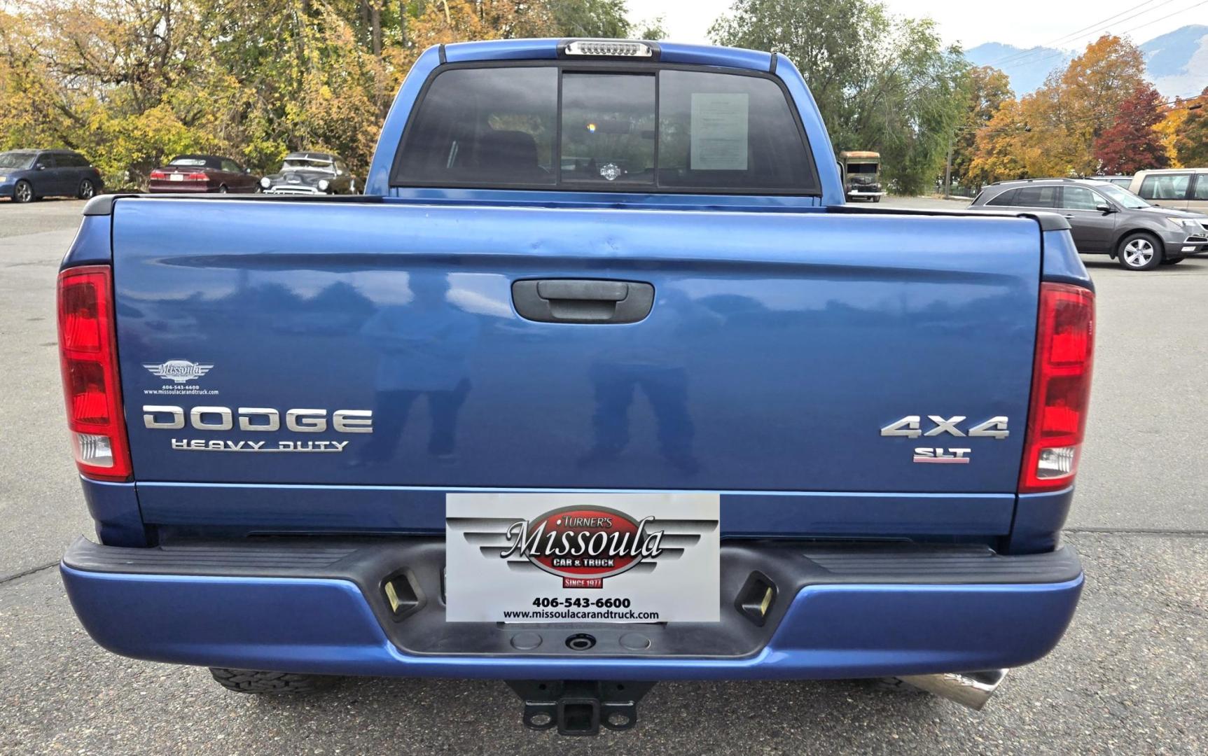 2003 Blue /Black Dodge Ram 2500 Laramie Quad Cab Long Bed 4WD (3D7KU28C13G) with an 5.9L L6 OHV 24V TURBO DIESEL engine, 6 Speed Manual transmission, located at 450 N Russell, Missoula, MT, 59801, (406) 543-6600, 46.874496, -114.017433 - Very Nice 5.9 Diesel 4WD Pickup. Hard to find 6 Speed Manual Transmission. Great Miles for it's age. Air Cruise. Tilt. Power Windows and Locks. Power Drivers Seat. Running Boards. Nice Tires and Wheels. Towing. Because of the age of this vehicle, financing is NOT available. - Photo#6
