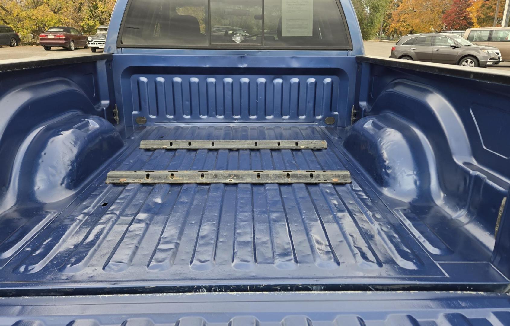 2003 Blue /Black Dodge Ram 2500 Laramie Quad Cab Long Bed 4WD (3D7KU28C13G) with an 5.9L L6 OHV 24V TURBO DIESEL engine, 6 Speed Manual transmission, located at 450 N Russell, Missoula, MT, 59801, (406) 543-6600, 46.874496, -114.017433 - Very Nice 5.9 Diesel 4WD Pickup. Hard to find 6 Speed Manual Transmission. Great Miles for it's age. Air Cruise. Tilt. Power Windows and Locks. Power Drivers Seat. Running Boards. Nice Tires and Wheels. Towing. Because of the age of this vehicle, financing is NOT available. - Photo#9