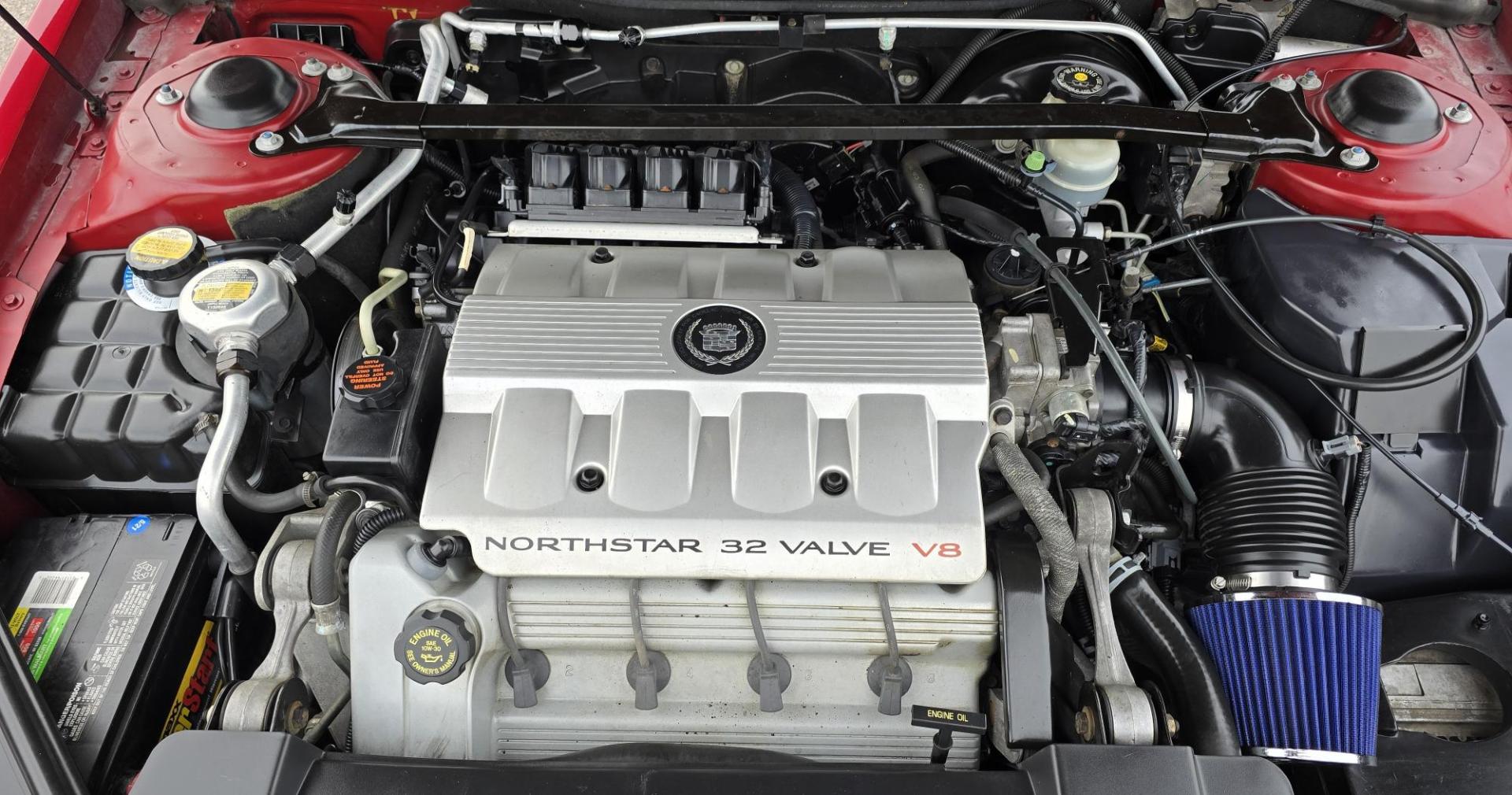 1999 Red /Black Cadillac Eldorado Touring Coupe (1G6ET129XXU) with an 4.6L V8 DOHC 32V engine, 4-Speed Automatic Overdrive transmission, located at 450 N Russell, Missoula, MT, 59801, (406) 543-6600, 46.874496, -114.017433 - Photo#18