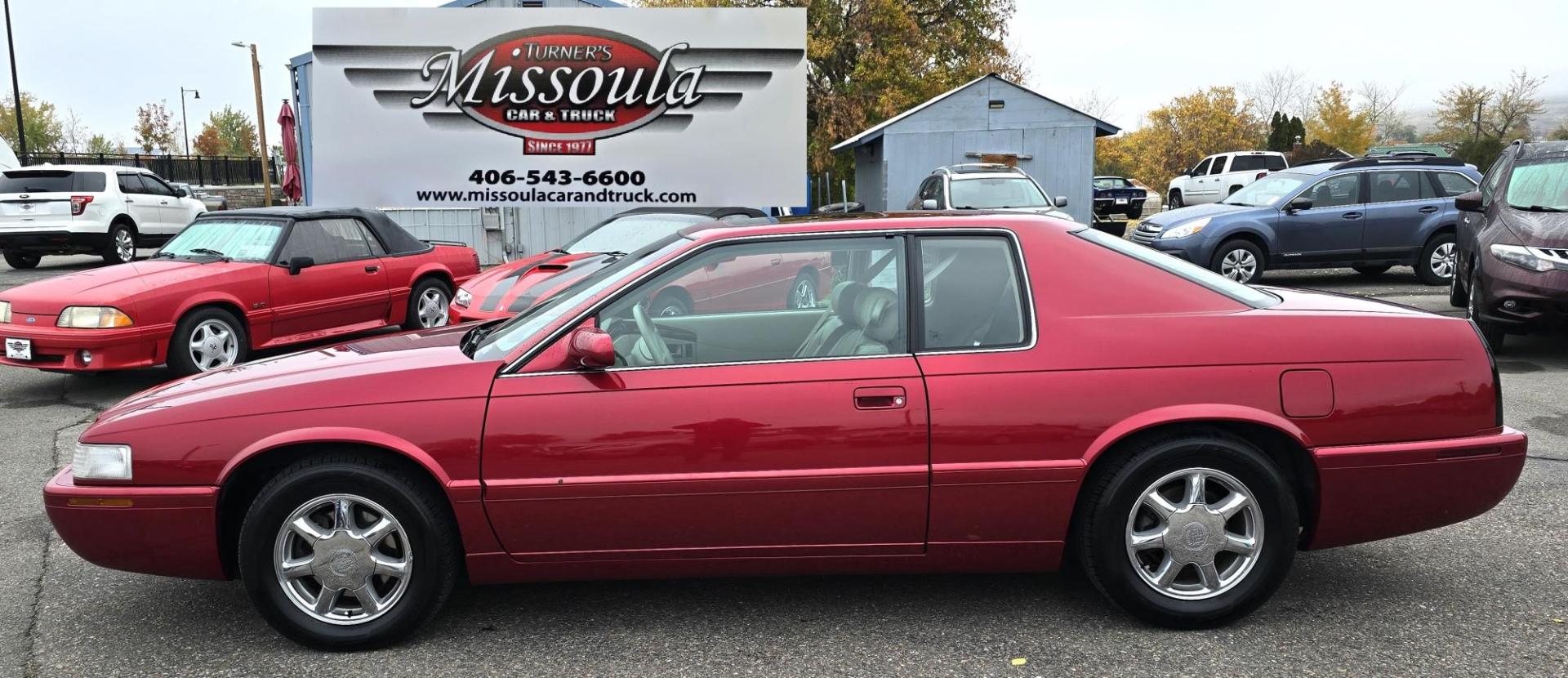 1999 Red /Black Cadillac Eldorado Touring Coupe (1G6ET129XXU) with an 4.6L V8 DOHC 32V engine, 4-Speed Automatic Overdrive transmission, located at 450 N Russell, Missoula, MT, 59801, (406) 543-6600, 46.874496, -114.017433 - Photo#1