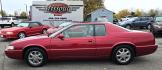 1999 Red /Black Cadillac Eldorado Touring Coupe (1G6ET129XXU) with an 4.6L V8 DOHC 32V engine, 4-Speed Automatic Overdrive transmission, located at 450 N Russell, Missoula, MT, 59801, (406) 543-6600, 46.874496, -114.017433 - Photo#1