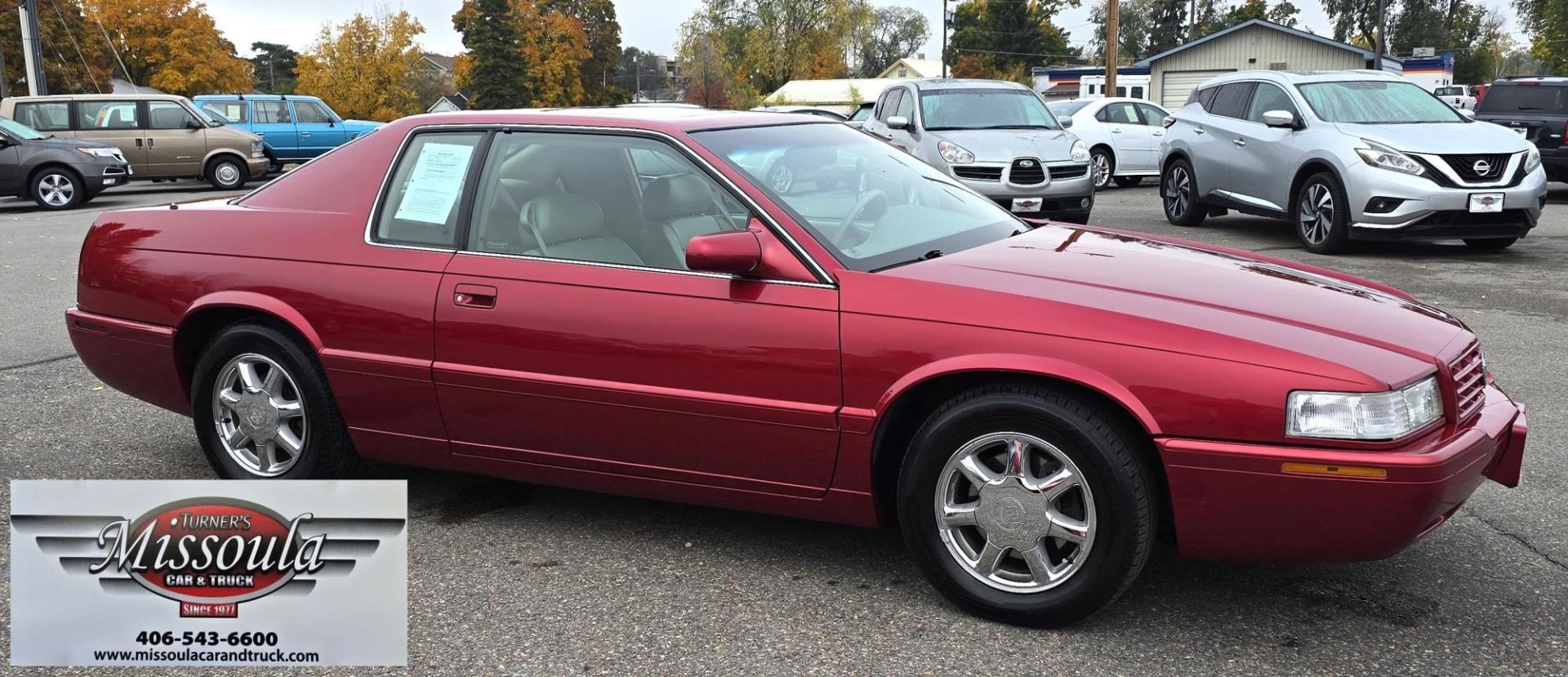 1999 Red /Black Cadillac Eldorado Touring Coupe (1G6ET129XXU) with an 4.6L V8 DOHC 32V engine, 4-Speed Automatic Overdrive transmission, located at 450 N Russell, Missoula, MT, 59801, (406) 543-6600, 46.874496, -114.017433 - Photo#3