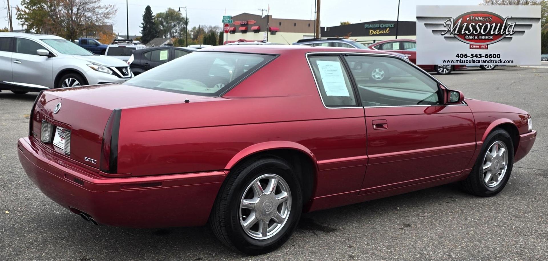 1999 Red /Black Cadillac Eldorado Touring Coupe (1G6ET129XXU) with an 4.6L V8 DOHC 32V engine, 4-Speed Automatic Overdrive transmission, located at 450 N Russell, Missoula, MT, 59801, (406) 543-6600, 46.874496, -114.017433 - Photo#4