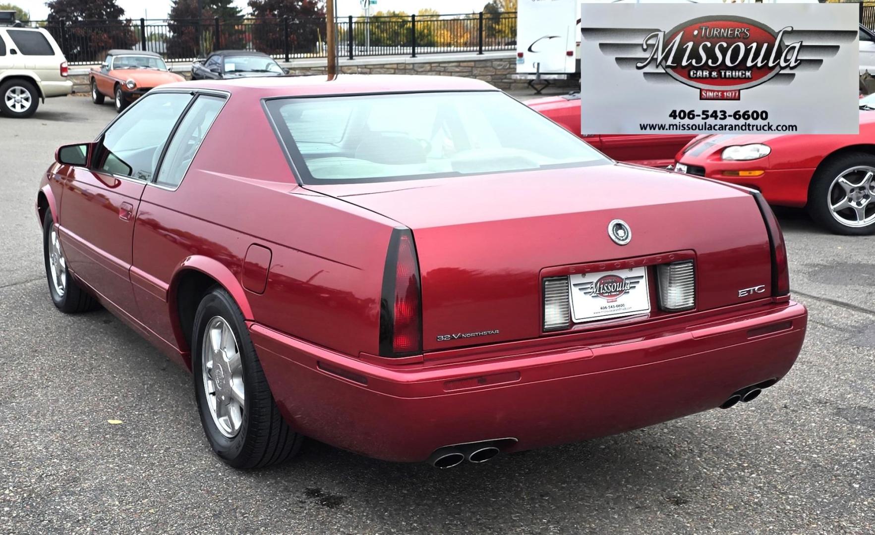 1999 Red /Black Cadillac Eldorado Touring Coupe (1G6ET129XXU) with an 4.6L V8 DOHC 32V engine, 4-Speed Automatic Overdrive transmission, located at 450 N Russell, Missoula, MT, 59801, (406) 543-6600, 46.874496, -114.017433 - Photo#7