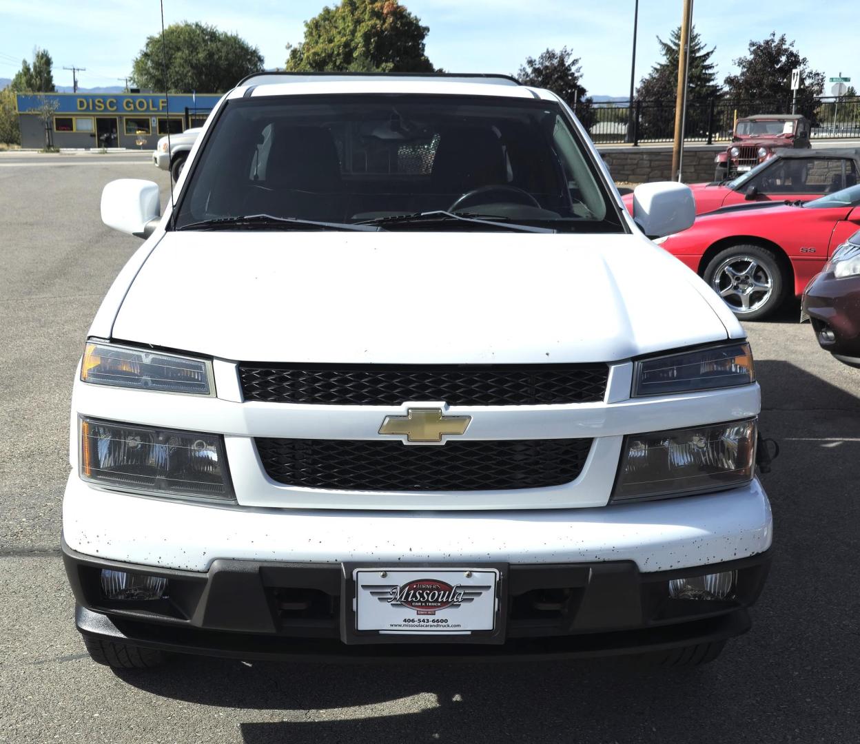 2012 White /Black Chevrolet Colorado Work Truck Ext. Cab 4WD (1GCJTBF95C8) with an 2.9L L4 DOHC 16V engine, Automatic transmission, located at 450 N Russell, Missoula, MT, 59801, (406) 543-6600, 46.874496, -114.017433 - Hard to find Colorado 4WD. 2.9L I4 Engine. New Timing Chain. Automatic. Former Animal Control Truck so it has a really nice Topper. Air Conditioning. Power Windows and Locks. Cruise Control. AM FM CD. - Photo#10