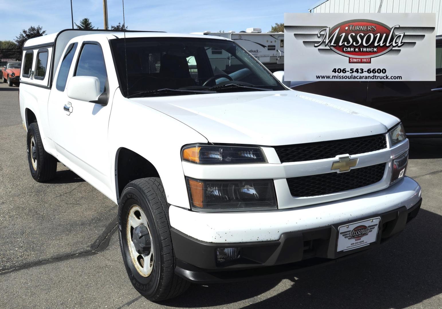 2012 White /Black Chevrolet Colorado Work Truck Ext. Cab 4WD (1GCJTBF95C8) with an 2.9L L4 DOHC 16V engine, Automatic transmission, located at 450 N Russell, Missoula, MT, 59801, (406) 543-6600, 46.874496, -114.017433 - Hard to find Colorado 4WD. 2.9L I4 Engine. New Timing Chain. Automatic. Former Animal Control Truck so it has a really nice Topper. Air Conditioning. Power Windows and Locks. Cruise Control. AM FM CD. - Photo#11