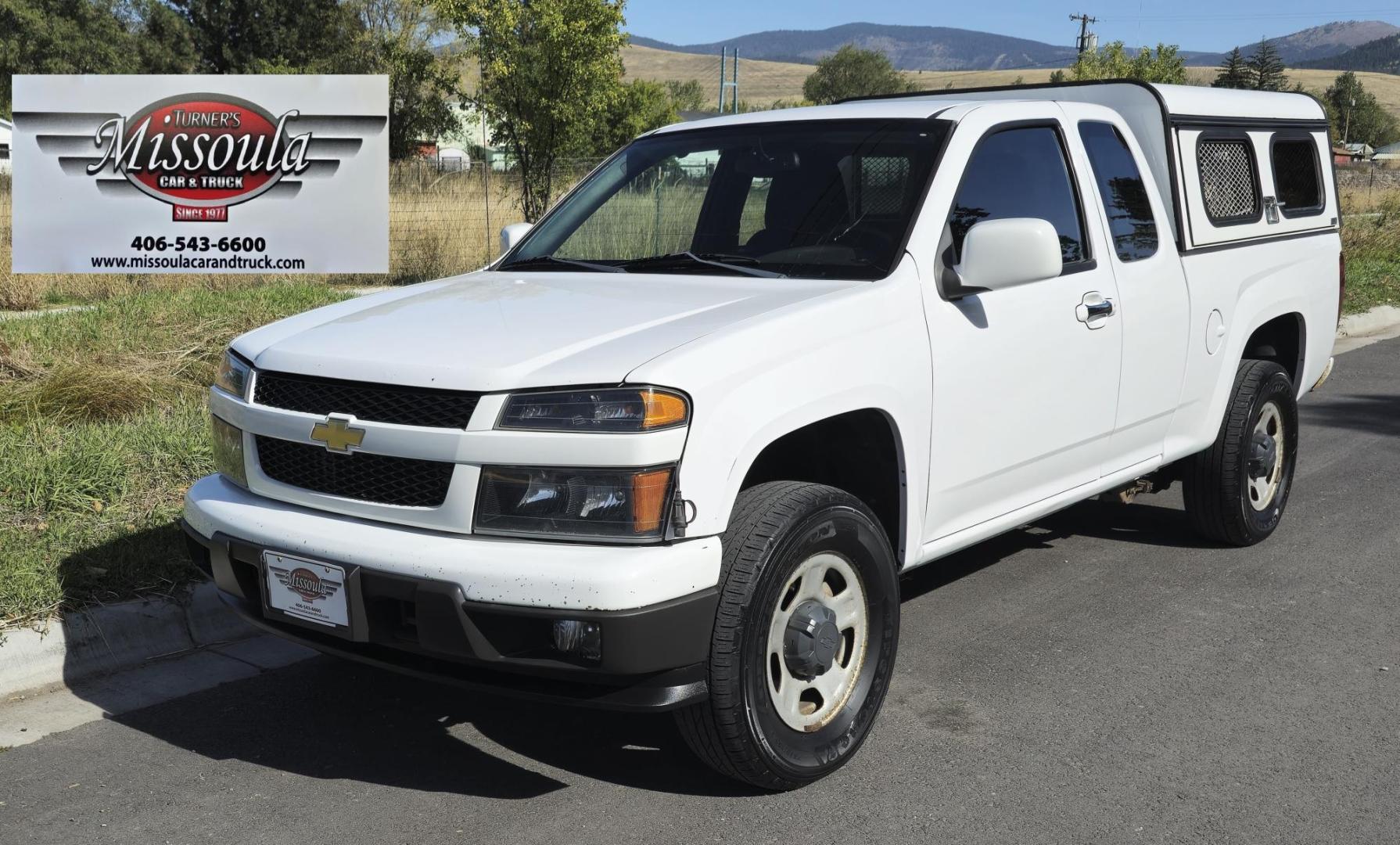 2012 White /Black Chevrolet Colorado Work Truck Ext. Cab 4WD (1GCJTBF95C8) with an 2.9L L4 DOHC 16V engine, Automatic transmission, located at 450 N Russell, Missoula, MT, 59801, (406) 543-6600, 46.874496, -114.017433 - Hard to find Colorado 4WD. 2.9L I4 Engine. New Timing Chain. Automatic. Former Animal Control Truck so it has a really nice Topper. Air Conditioning. Power Windows and Locks. Cruise Control. AM FM CD. - Photo#2