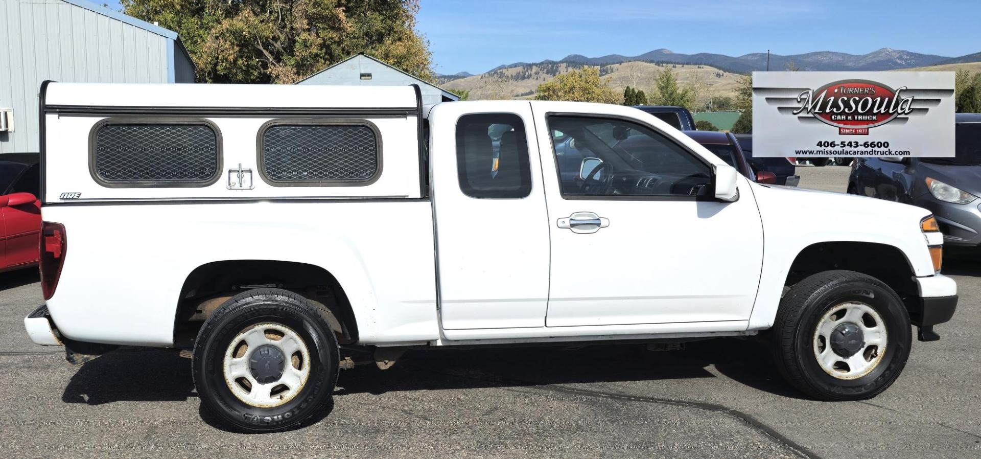 2012 White /Black Chevrolet Colorado Work Truck Ext. Cab 4WD (1GCJTBF95C8) with an 2.9L L4 DOHC 16V engine, Automatic transmission, located at 450 N Russell, Missoula, MT, 59801, (406) 543-6600, 46.874496, -114.017433 - Hard to find Colorado 4WD. 2.9L I4 Engine. New Timing Chain. Automatic. Former Animal Control Truck so it has a really nice Topper. Air Conditioning. Power Windows and Locks. Cruise Control. AM FM CD. - Photo#9