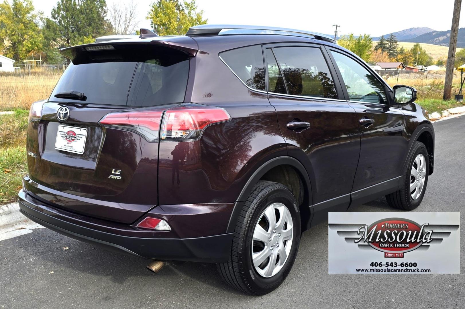 2017 Maroon /Black Toyota RAV4 LE AWD (2T3BFREV7HW) with an 2.5L L4 DOHC 16V engine, 6A transmission, located at 450 N Russell, Missoula, MT, 59801, (406) 543-6600, 46.874496, -114.017433 - Beautiful Maroon AWD SUV. 2.4L I4 Engine. Automatic. Air. Cruise. Tilt. AM FM CD. Power Windows and Locks. Backup Camera. Bluetooth. Eco Drive. Michelin Tires. - Photo#1