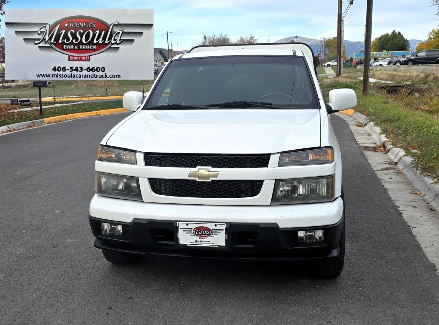 2009 White /Black Chevrolet Colorado Work Truck Ext. Cab 4WD (1GCDT19E998) with an 3.7L L5 DOHC 20V engine, Automatic transmission, located at 450 N Russell, Missoula, MT, 59801, (406) 543-6600, 46.874496, -114.017433 - 1 Owner. Clean Carfax. Former Missoula Animal Control Truck with Nice Topper. 4WD. 3.7L I5 Engine. Automatic Transmission. Air Conditioning. Cruise Control. Power Windows and Locks. Comes with Original Tailgate in case you want to take the topper off. - Photo#3