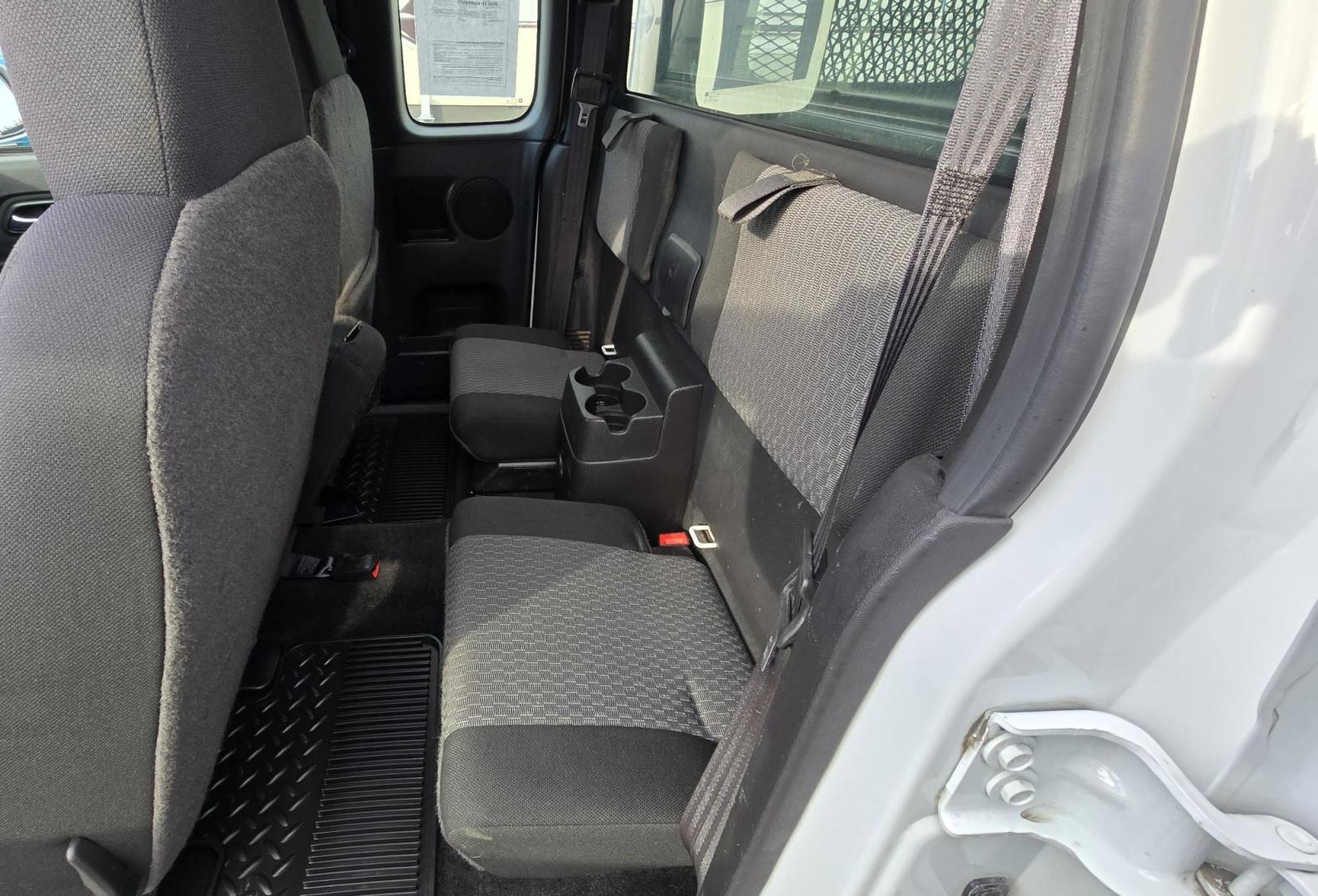 2009 White /Black Chevrolet Colorado Work Truck Ext. Cab 4WD (1GCDT19E998) with an 3.7L L5 DOHC 20V engine, Automatic transmission, located at 450 N Russell, Missoula, MT, 59801, (406) 543-6600, 46.874496, -114.017433 - 1 Owner. Clean Carfax. Former Missoula Animal Control Truck with Nice Topper. 4WD. 3.7L I5 Engine. Automatic Transmission. Air Conditioning. Cruise Control. Power Windows and Locks. Comes with Original Tailgate in case you want to take the topper off. - Photo#10