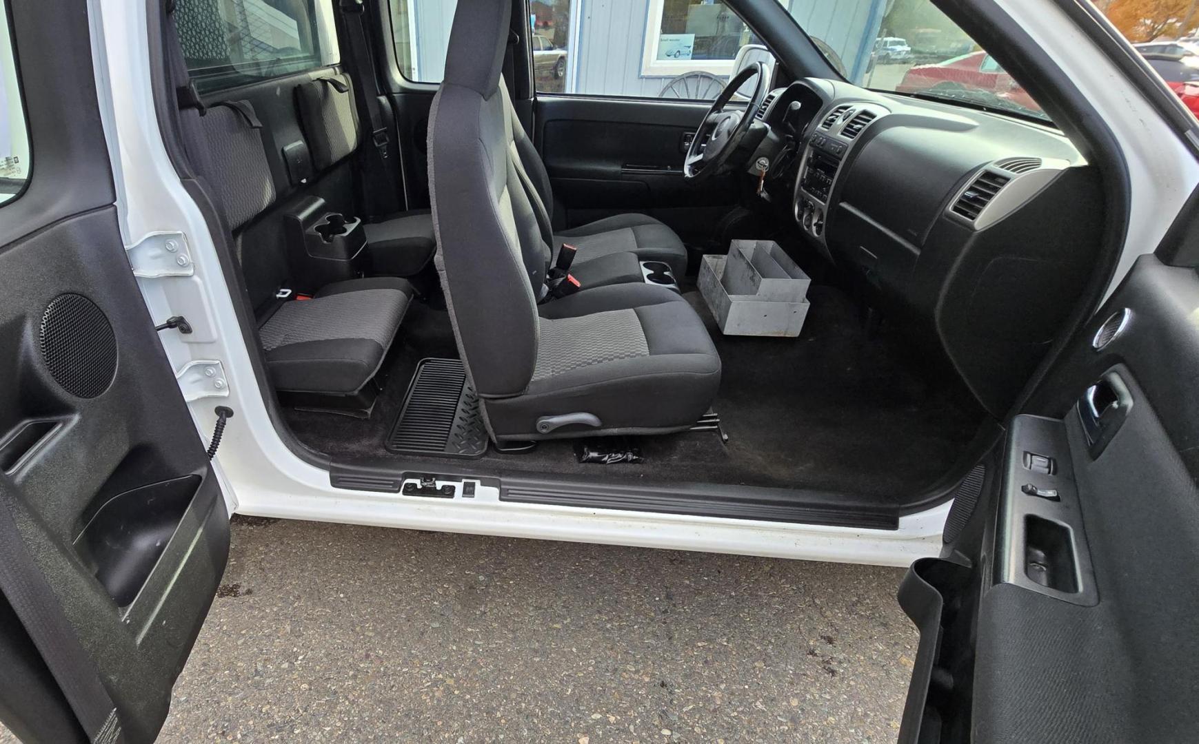 2009 White /Black Chevrolet Colorado Work Truck Ext. Cab 4WD (1GCDT19E998) with an 3.7L L5 DOHC 20V engine, Automatic transmission, located at 450 N Russell, Missoula, MT, 59801, (406) 543-6600, 46.874496, -114.017433 - 1 Owner. Clean Carfax. Former Missoula Animal Control Truck with Nice Topper. 4WD. 3.7L I5 Engine. Automatic Transmission. Air Conditioning. Cruise Control. Power Windows and Locks. Comes with Original Tailgate in case you want to take the topper off. - Photo#13