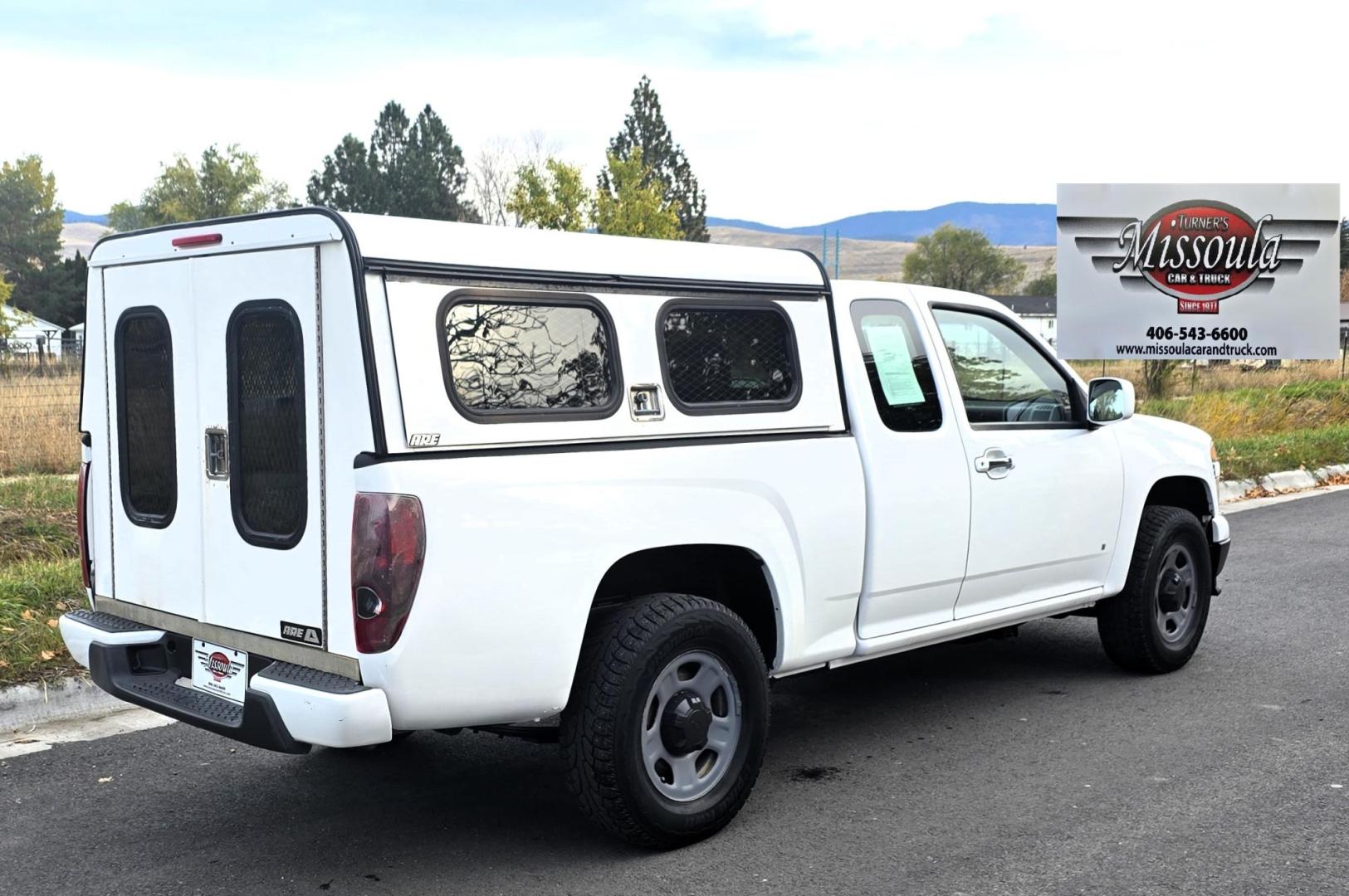 2009 White /Black Chevrolet Colorado Work Truck Ext. Cab 4WD (1GCDT19E998) with an 3.7L L5 DOHC 20V engine, Automatic transmission, located at 450 N Russell, Missoula, MT, 59801, (406) 543-6600, 46.874496, -114.017433 - 1 Owner. Clean Carfax. Former Missoula Animal Control Truck with Nice Topper. 4WD. 3.7L I5 Engine. Automatic Transmission. Air Conditioning. Cruise Control. Power Windows and Locks. Comes with Original Tailgate in case you want to take the topper off. - Photo#4