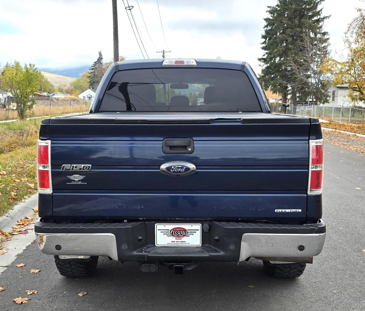 2013 Blue /Black Ford F-150 XLT SuperCrew 6.5-ft. Bed 4WD (1FTFW1EF1DK) with an 5.0L V8 engine, 6-Speed Automatic transmission, located at 450 N Russell, Missoula, MT, 59801, (406) 543-6600, 46.874496, -114.017433 - Don't let the miles scare you. This truck runs amazing. 4WD. 5.0 V8 Engine. Automatic Transmission. Air. Cruise. Tilt. Power Windows and Locks. Backup Camera. AM FM XM. Bluetooth for Audio and Phone. Nice custom Wheels. Tonneau Cover. Clean Carfax and Title. Financing is NOT Available on this V - Photo#6
