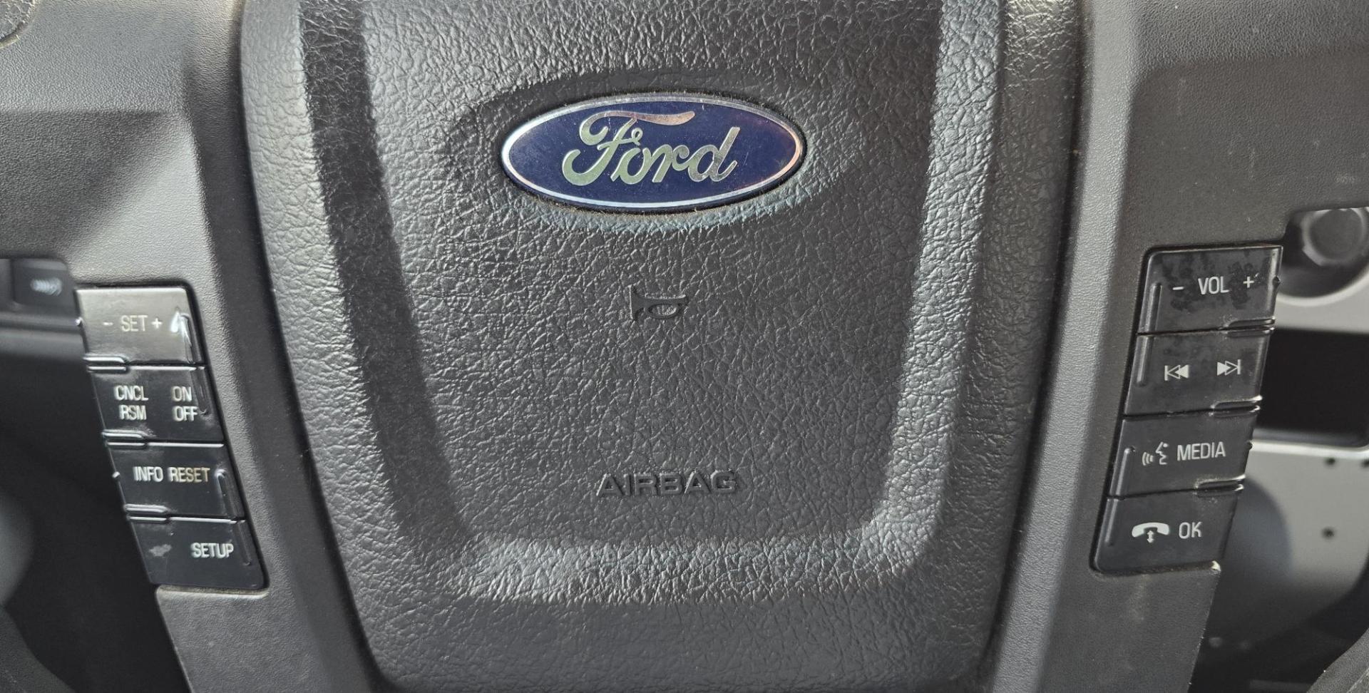 2013 Blue /Black Ford F-150 XLT SuperCrew 6.5-ft. Bed 4WD (1FTFW1EF1DK) with an 5.0L V8 engine, 6-Speed Automatic transmission, located at 450 N Russell, Missoula, MT, 59801, (406) 543-6600, 46.874496, -114.017433 - Don't let the miles scare you. This truck runs amazing. 4WD. 5.0 V8 Engine. Automatic Transmission. Air. Cruise. Tilt. Power Windows and Locks. Backup Camera. AM FM XM. Bluetooth for Audio and Phone. Nice custom Wheels. Tonneau Cover. Clean Carfax and Title. Financing is NOT Available on this V - Photo#17