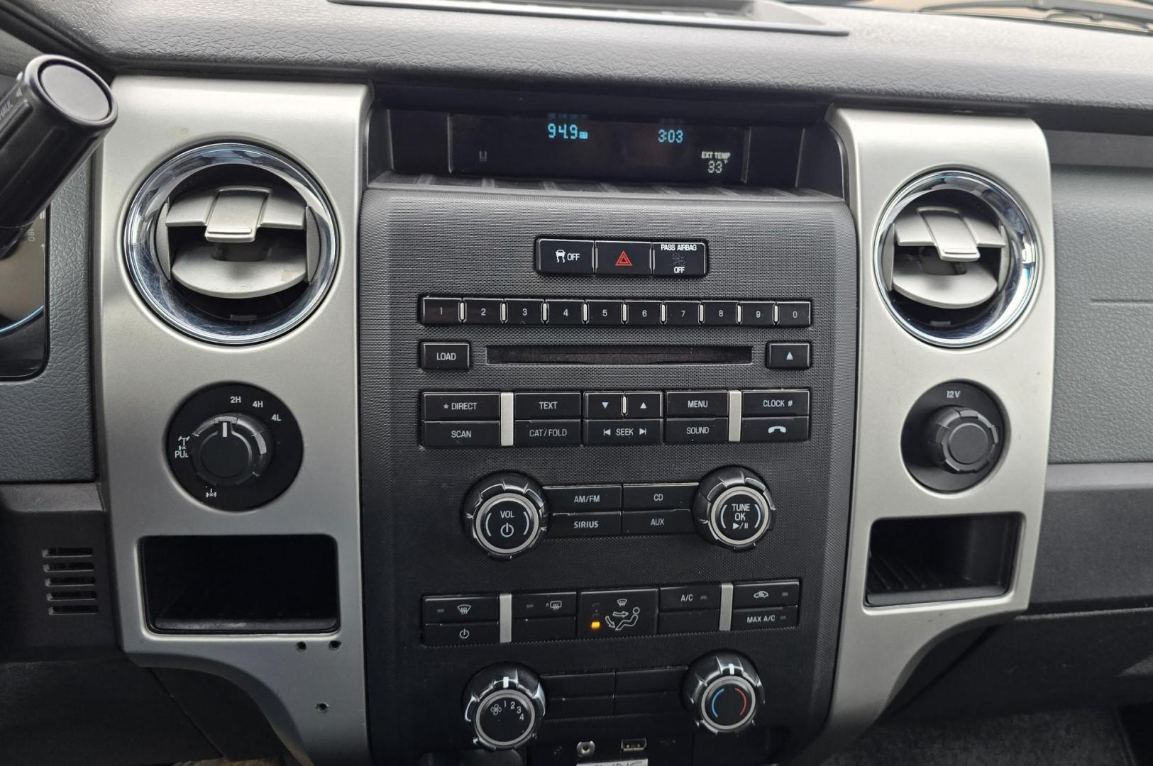 2013 Blue /Black Ford F-150 XLT SuperCrew 6.5-ft. Bed 4WD (1FTFW1EF1DK) with an 5.0L V8 engine, 6-Speed Automatic transmission, located at 450 N Russell, Missoula, MT, 59801, (406) 543-6600, 46.874496, -114.017433 - Don't let the miles scare you. This truck runs amazing. 4WD. 5.0 V8 Engine. Automatic Transmission. Air. Cruise. Tilt. Power Windows and Locks. Backup Camera. AM FM XM. Bluetooth for Audio and Phone. Nice custom Wheels. Tonneau Cover. Clean Carfax and Title. Financing is NOT Available on this V - Photo#18