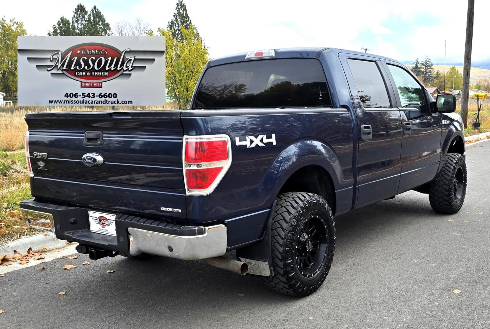 2013 Blue /Black Ford F-150 XLT SuperCrew 6.5-ft. Bed 4WD (1FTFW1EF1DK) with an 5.0L V8 engine, 6-Speed Automatic transmission, located at 450 N Russell, Missoula, MT, 59801, (406) 543-6600, 46.874496, -114.017433 - Don't let the miles scare you. This truck runs amazing. 4WD. 5.0 V8 Engine. Automatic Transmission. Air. Cruise. Tilt. Power Windows and Locks. Backup Camera. AM FM XM. Bluetooth for Audio and Phone. Nice custom Wheels. Tonneau Cover. Clean Carfax and Title. Financing is NOT Available on this V - Photo#1